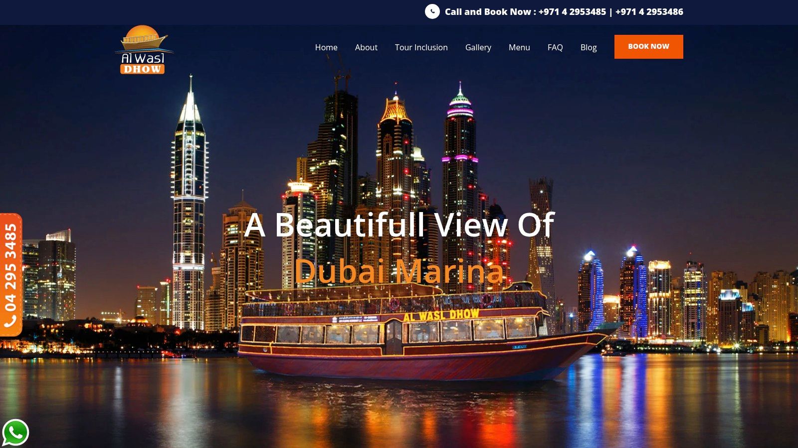 A traditional wooden dhow from Al Wasl Dhow sailing through Dubai Marina at night, illuminated by city lights.