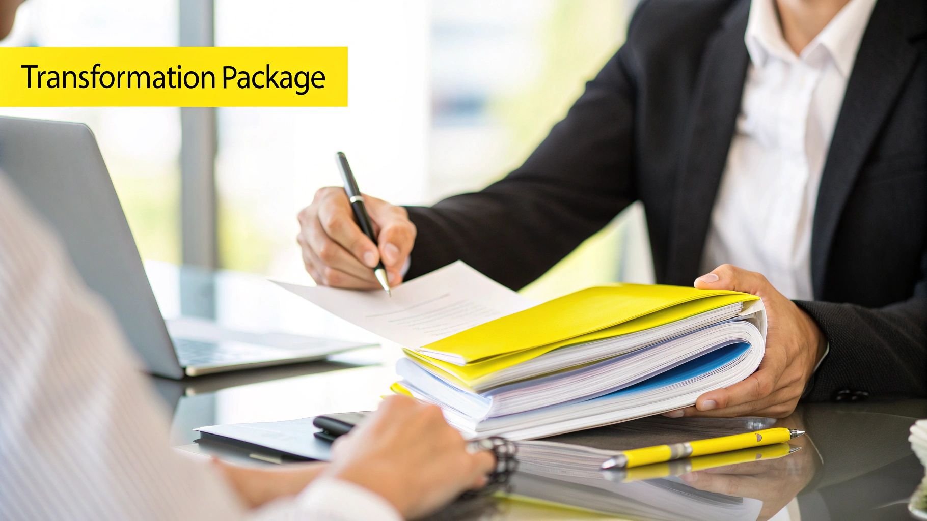 Business professionals signing documents and holding folders related to a 'Transformation Package'.