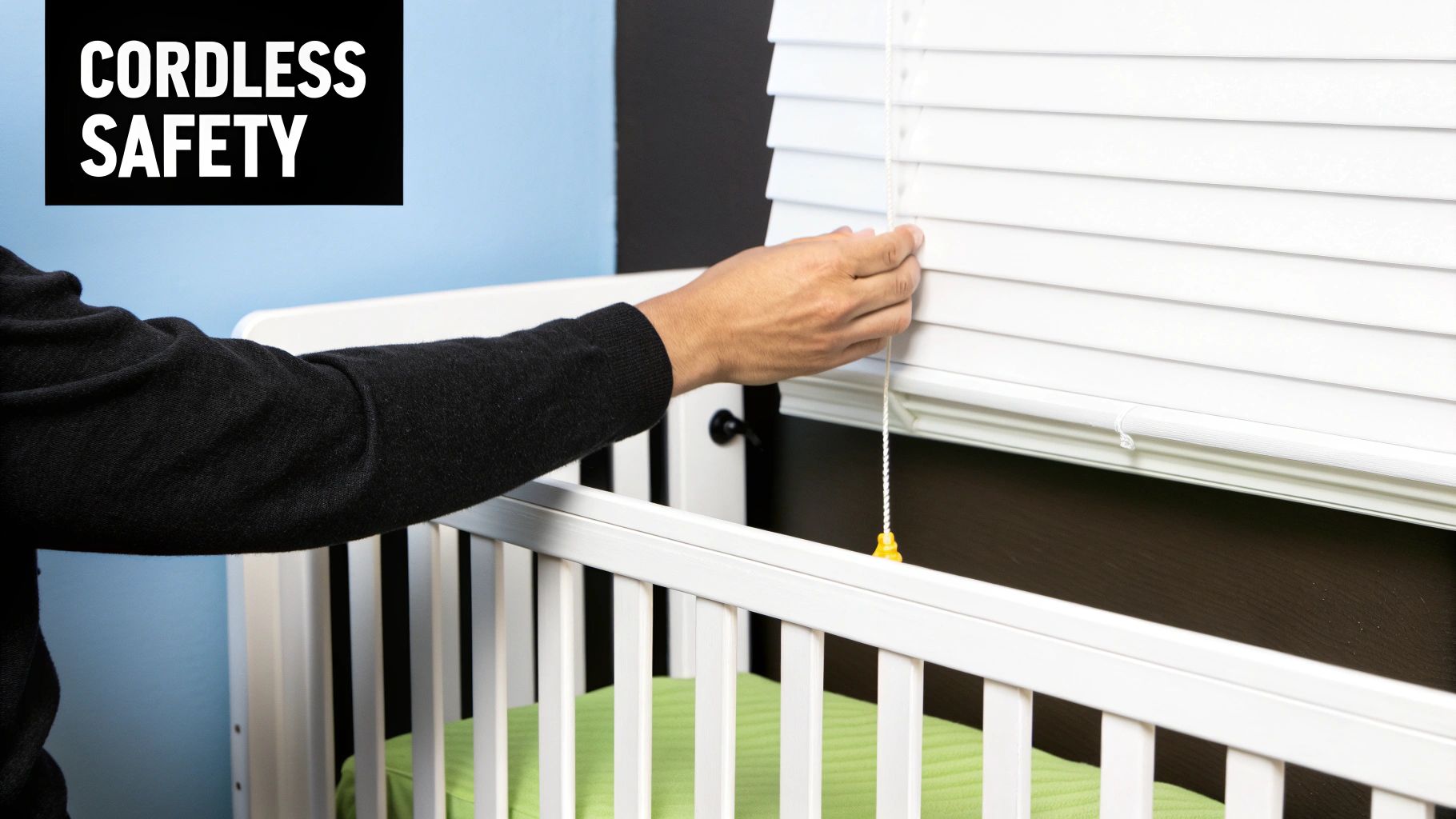 A parent adjusting a cordless cellular shade in a bright, modern nursery, demonstrating its ease of use and safe design.