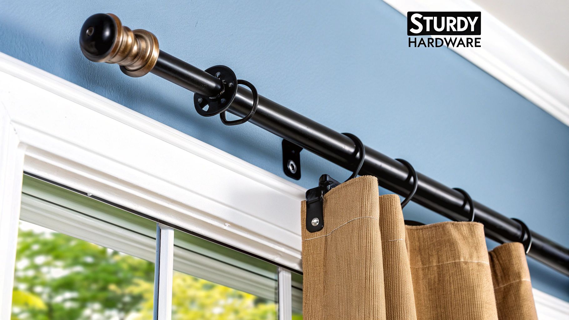A stylish, thick metal curtain rod securely mounted above a large window, supporting heavy drapes with decorative finials.