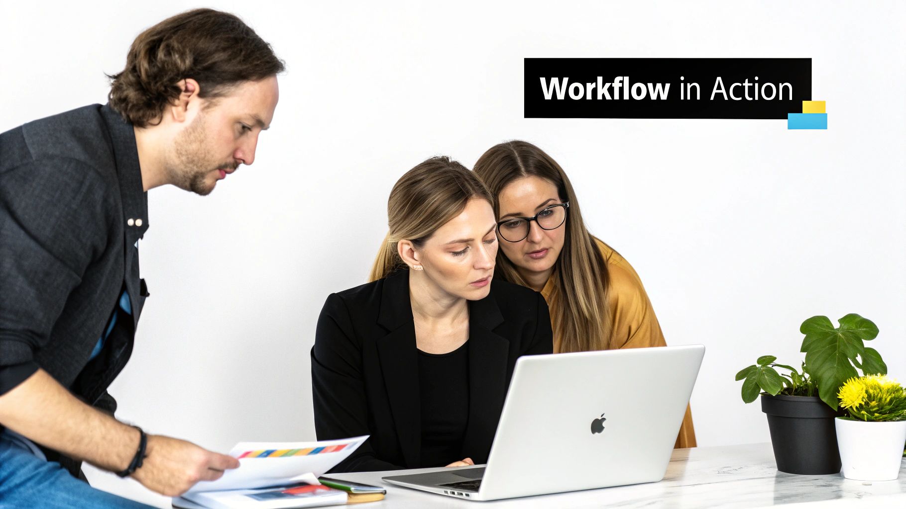 Team members discussing a project plan on a whiteboard with sticky notes.