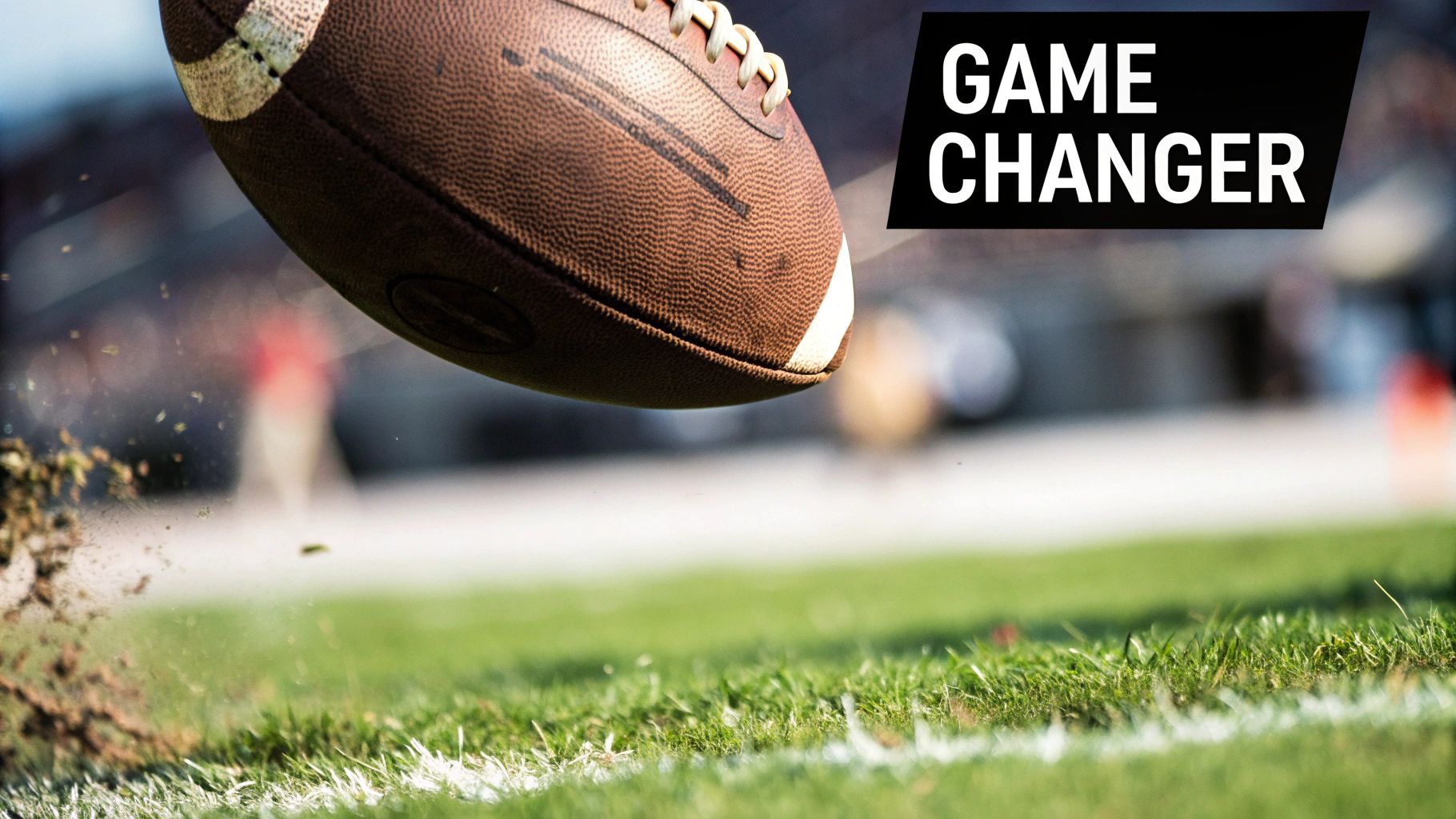 A person checking the pressure of a football with a gauge on a green pitch