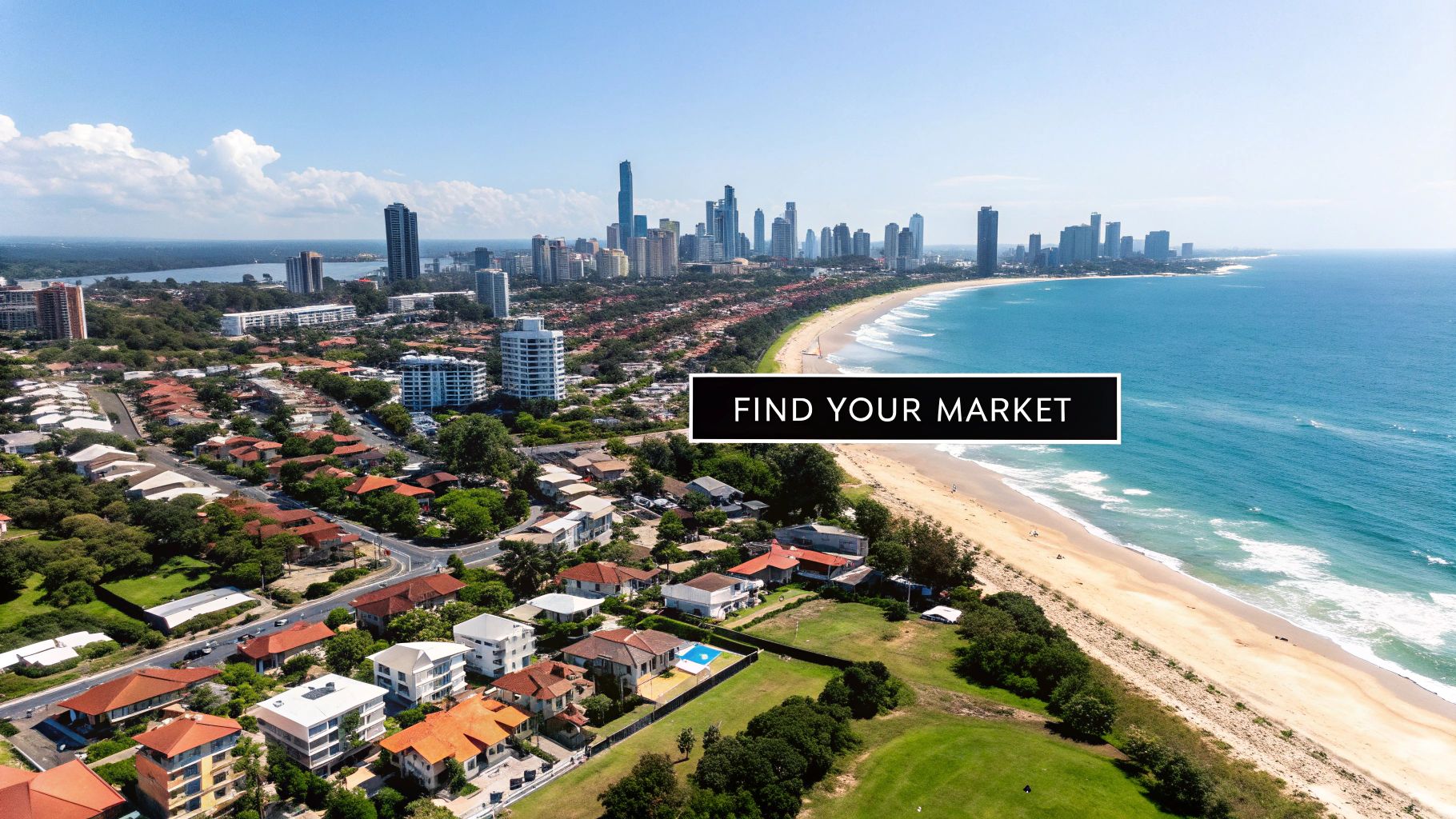 Aerial view of a vibrant coastal city with a modern skyline, sandy beach, and residential areas.