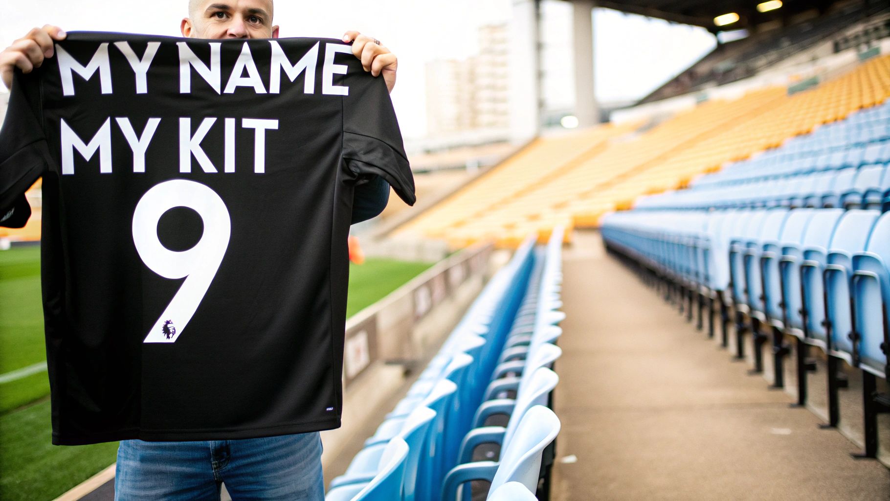 A close-up of a personalised football shirt with a name and number being printed on the back.