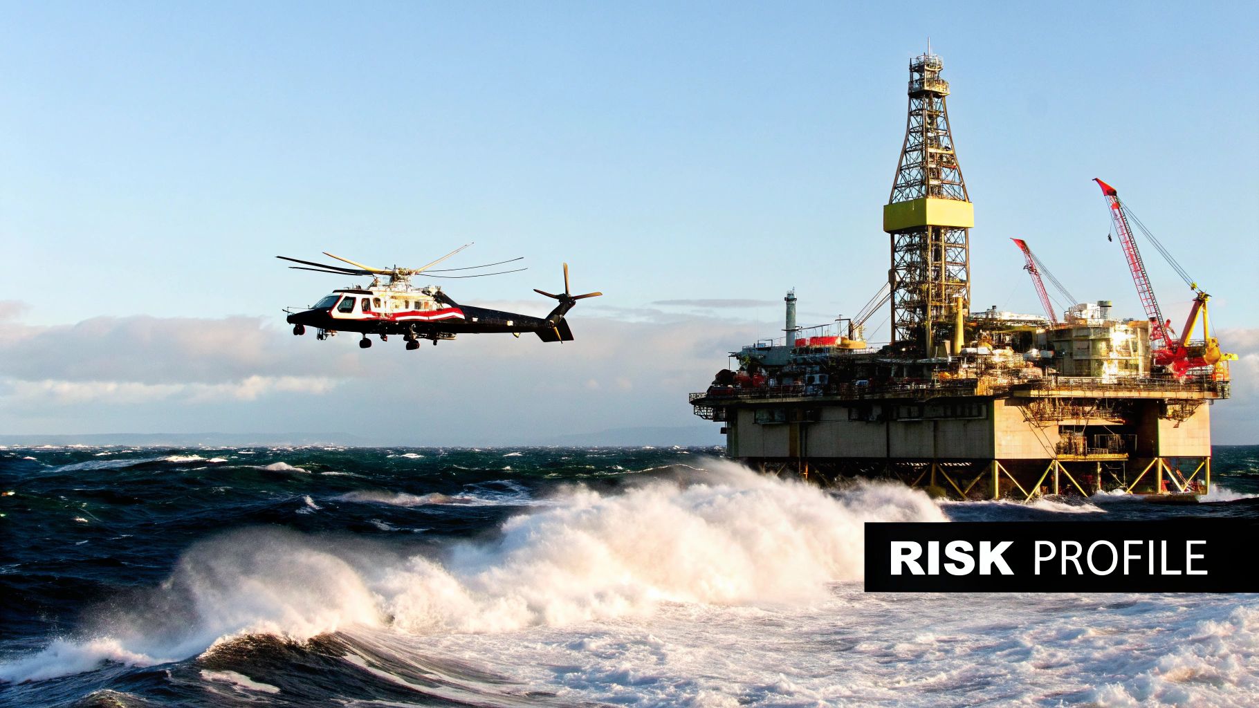 Offshore worker on a platform looking out at the sea