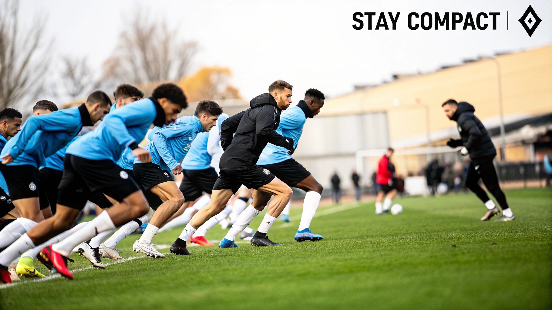 A defensive unit maintaining a compact shape during a training drill.