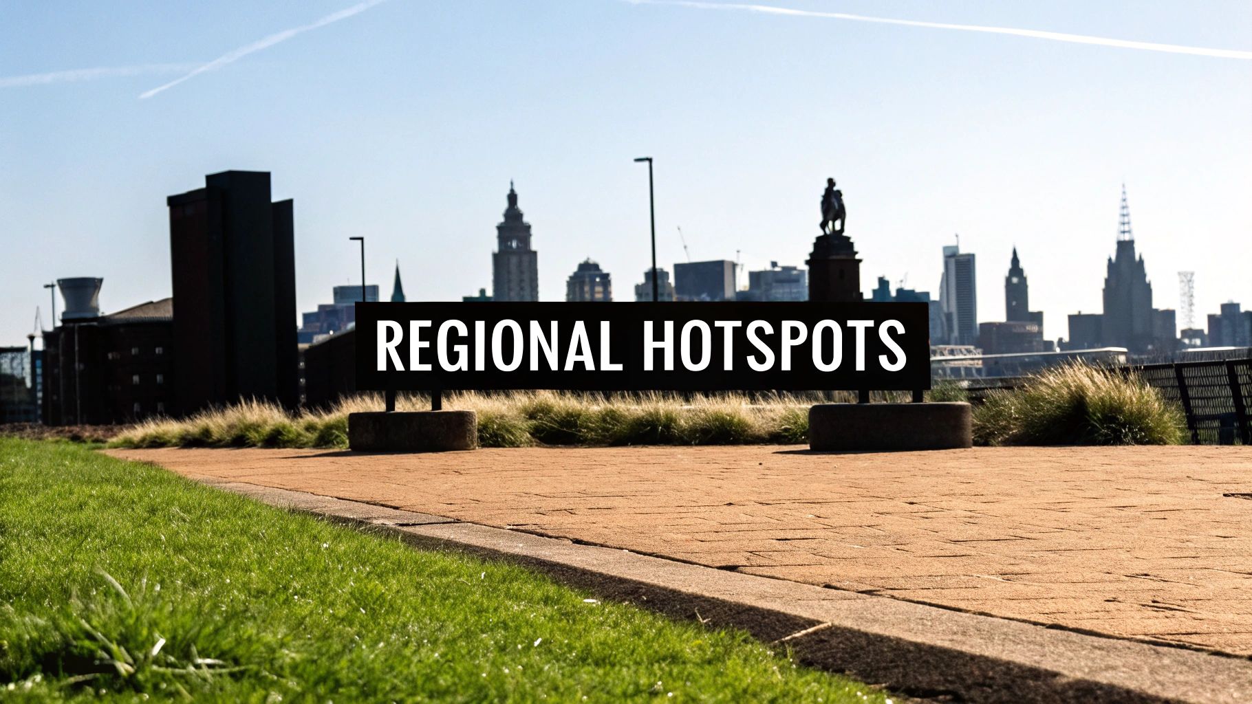 A banner displaying "REGIONAL HOTSPOTS" against a cityscape backdrop with grass and a clear sky.