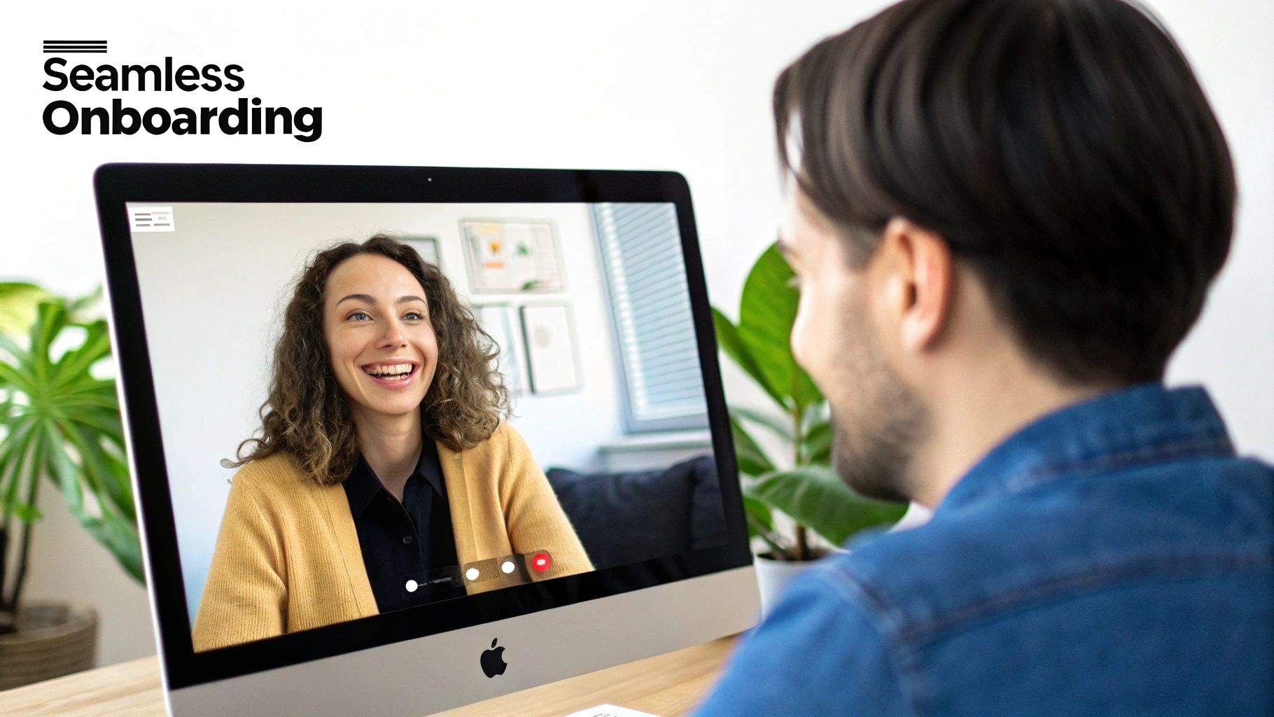 A person showing a new freelance content creator a project plan on a tablet in a collaborative office space.
