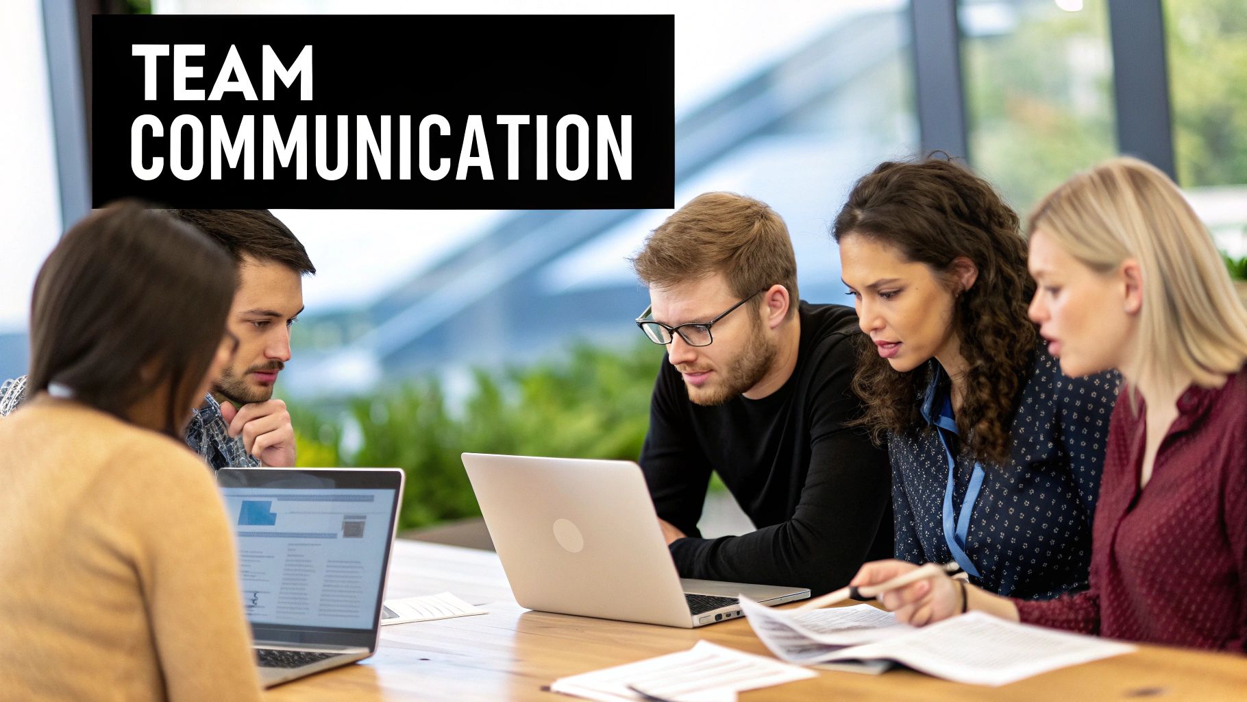 A group of colleagues communicating effectively in an office setting
