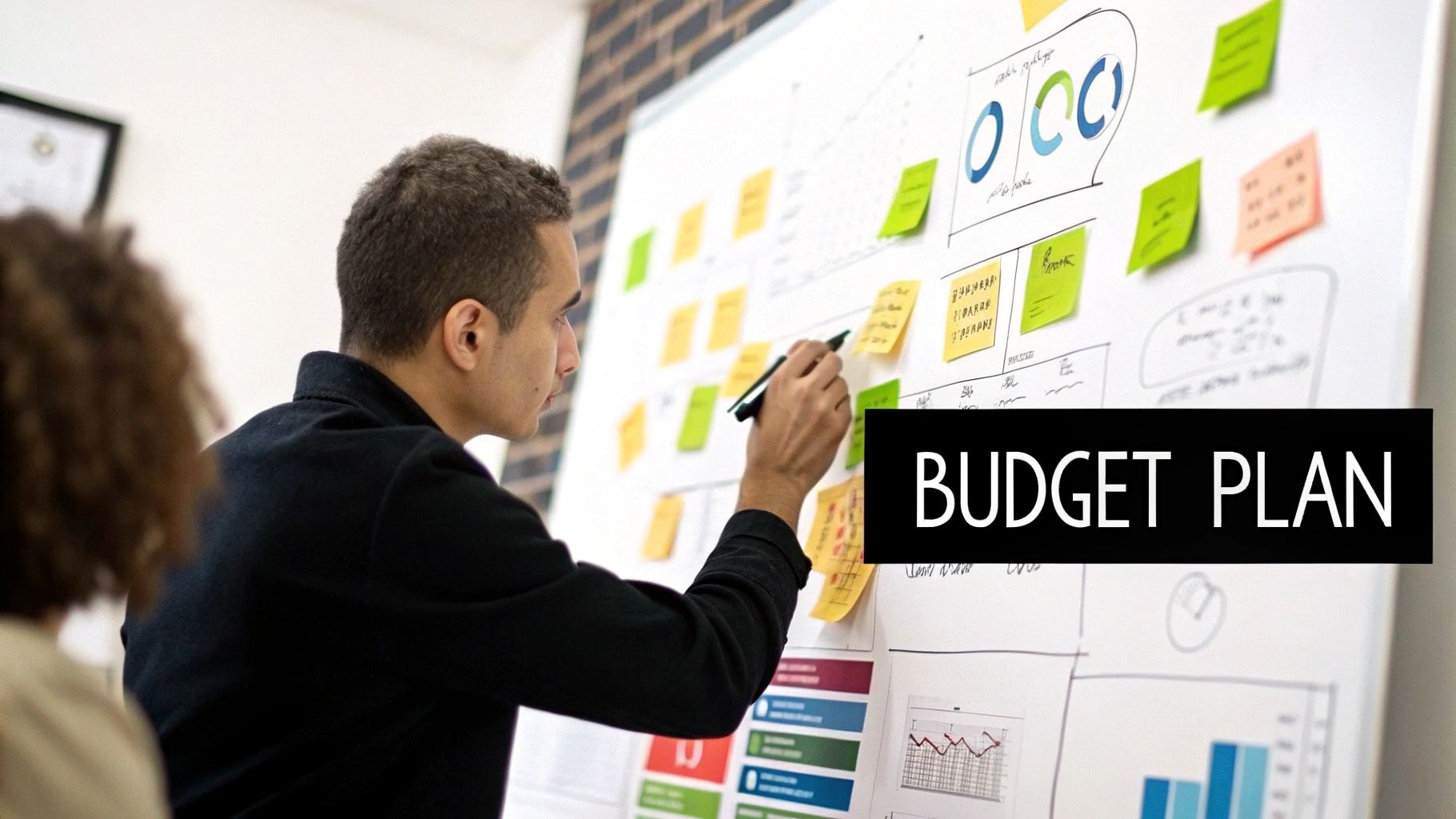 A person using a calculator and writing in a notebook, with social media icons floating around, symbolizing budget planning.