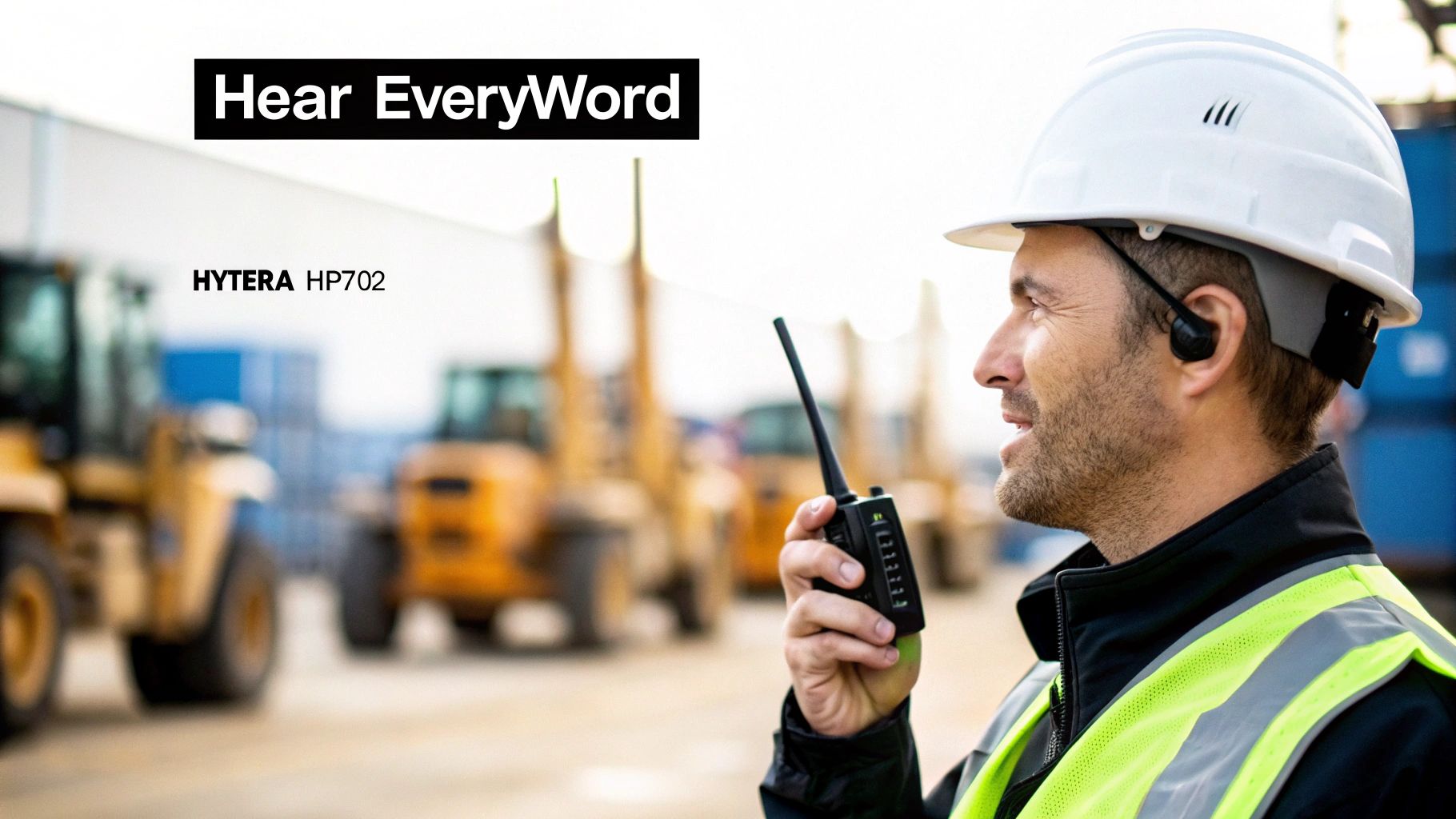 A person using a Hytera HP702 radio in a professional setting.