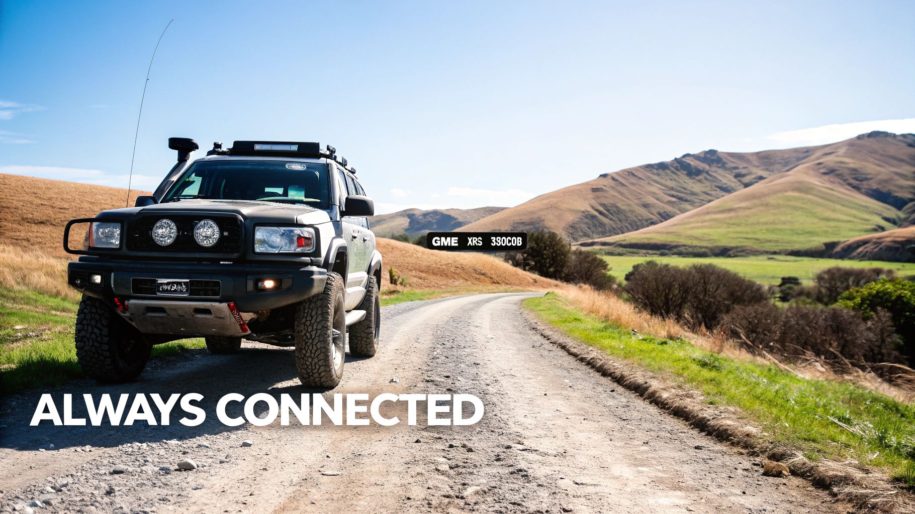 A GME XRS 330COB radio unit with its microphone, ready for installation in a 4WD vehicle for outdoor adventures.