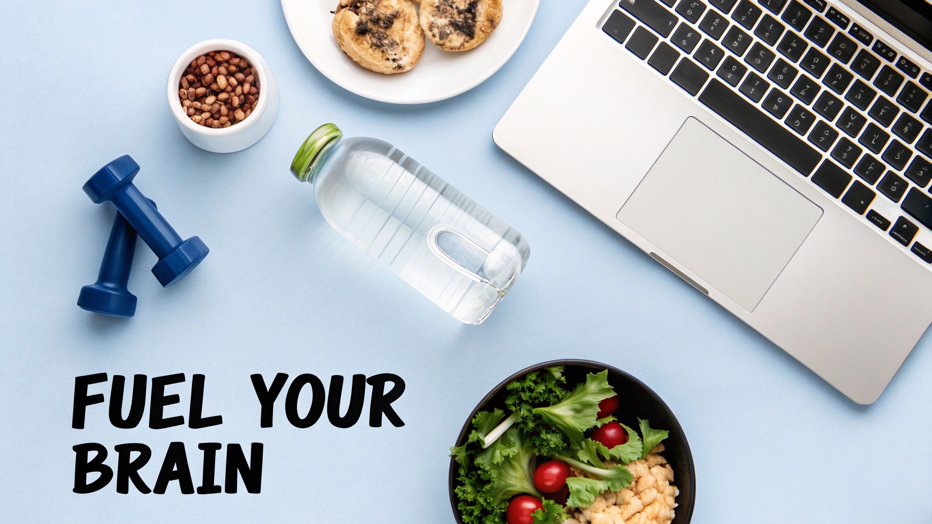 Flat lay of healthy lifestyle essentials: laptop, dumbbells, water, nuts, salad, and pancakes on a blue background.