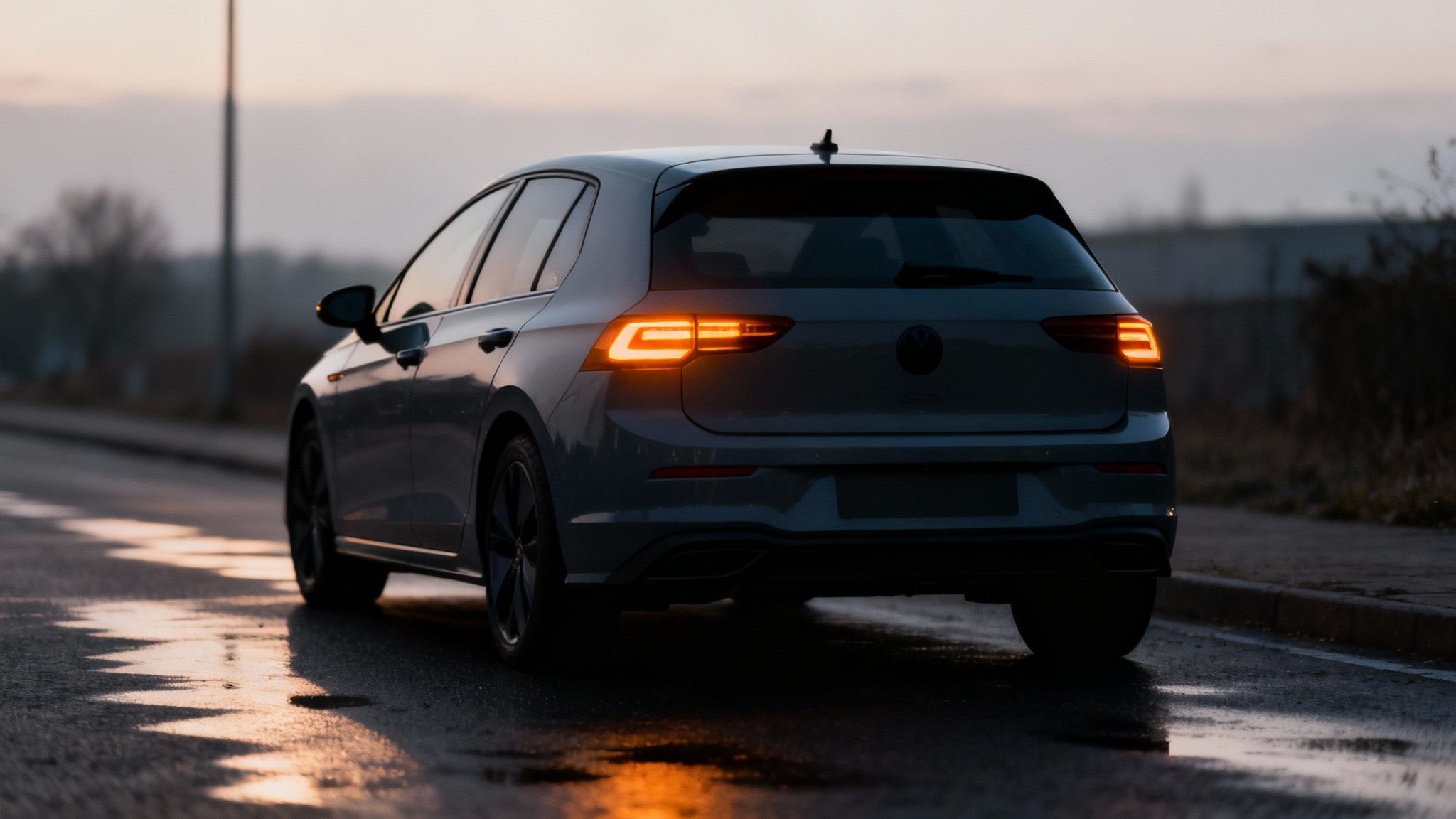 A warning light illuminated on a modern car's dashboard.