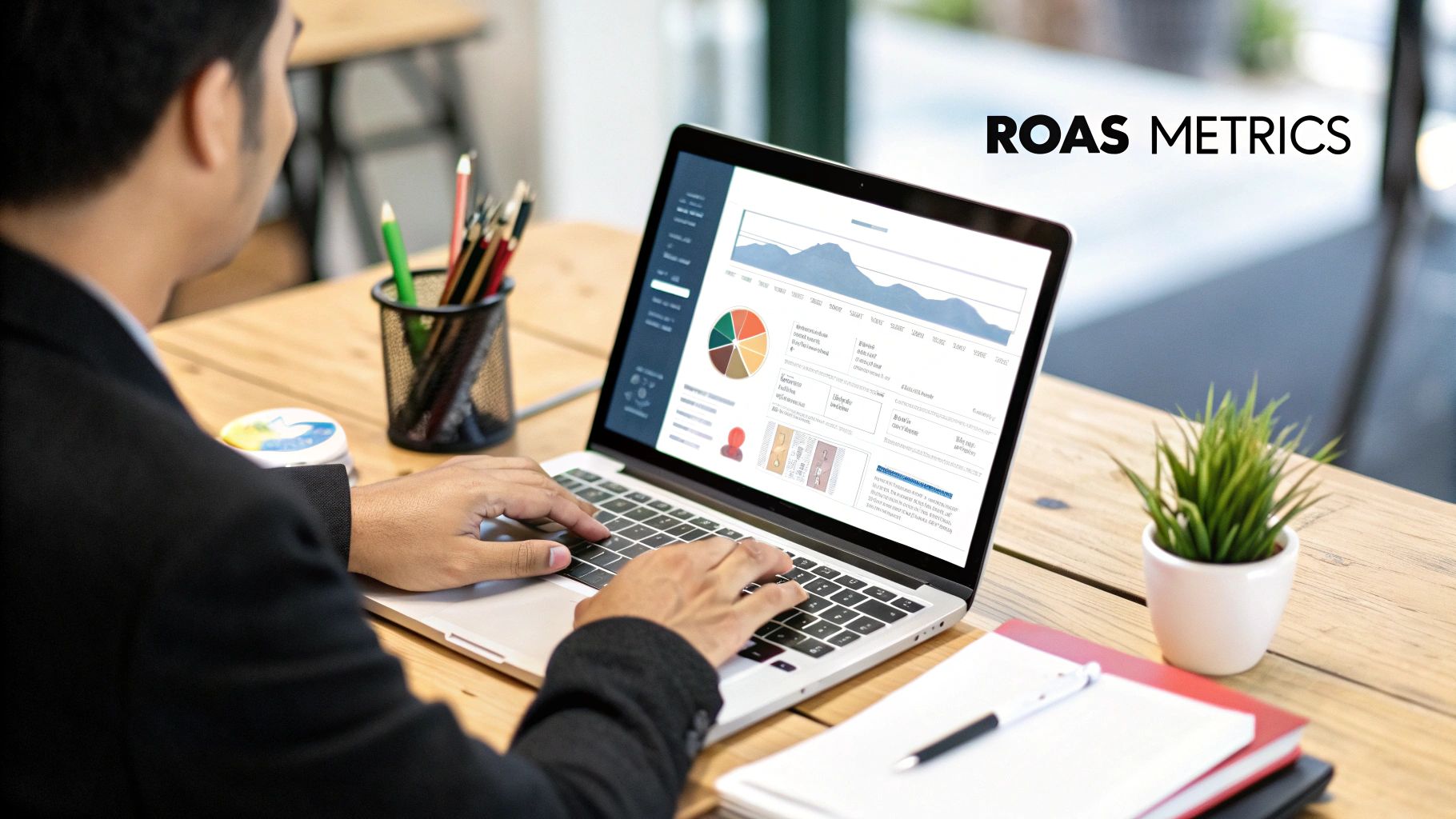 Marketer analysing ROAS on a dashboard to measure key performance indicators for digital marketing campaigns