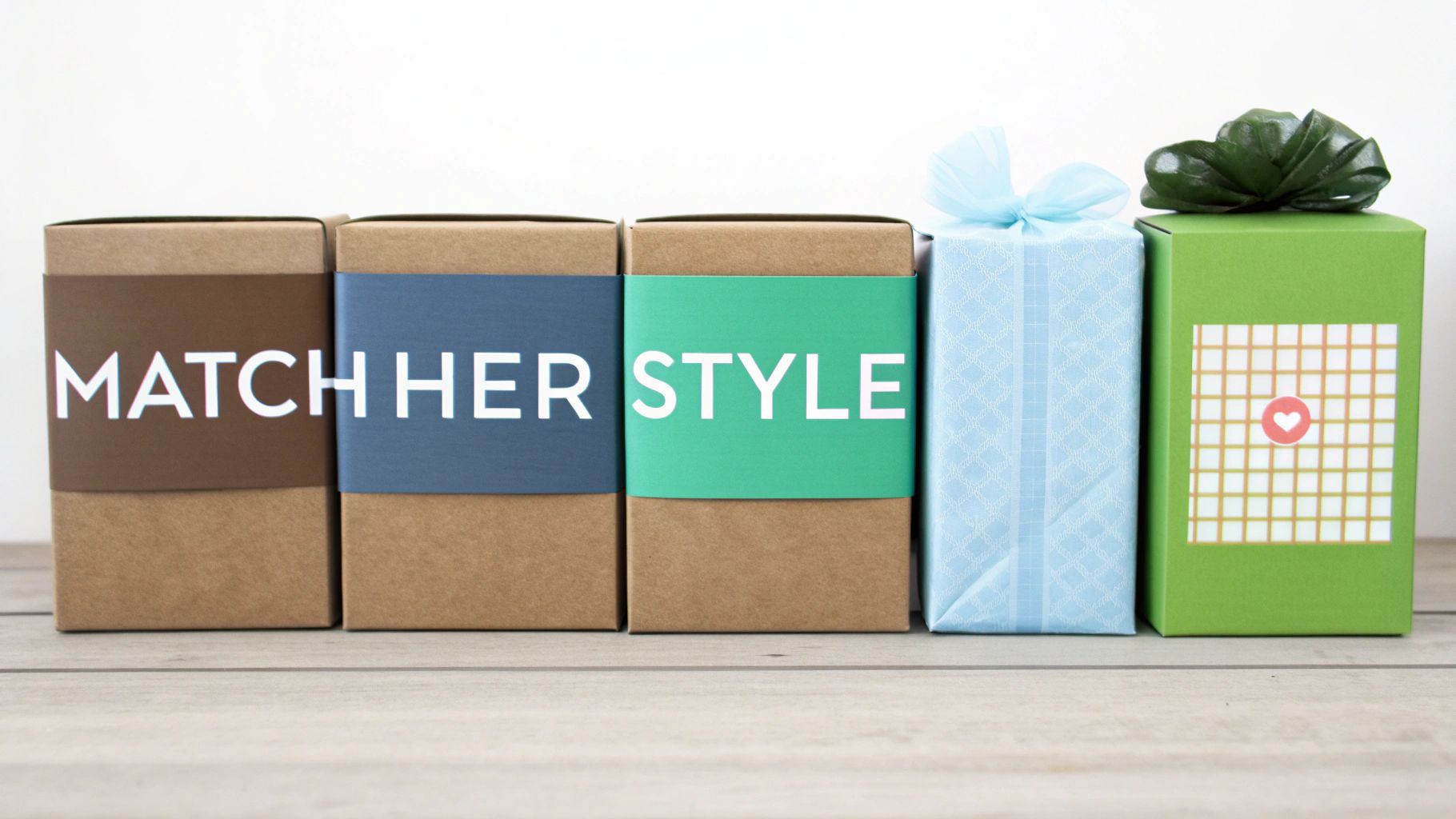 A new mum smiling as she receives a beautifully wrapped gift.