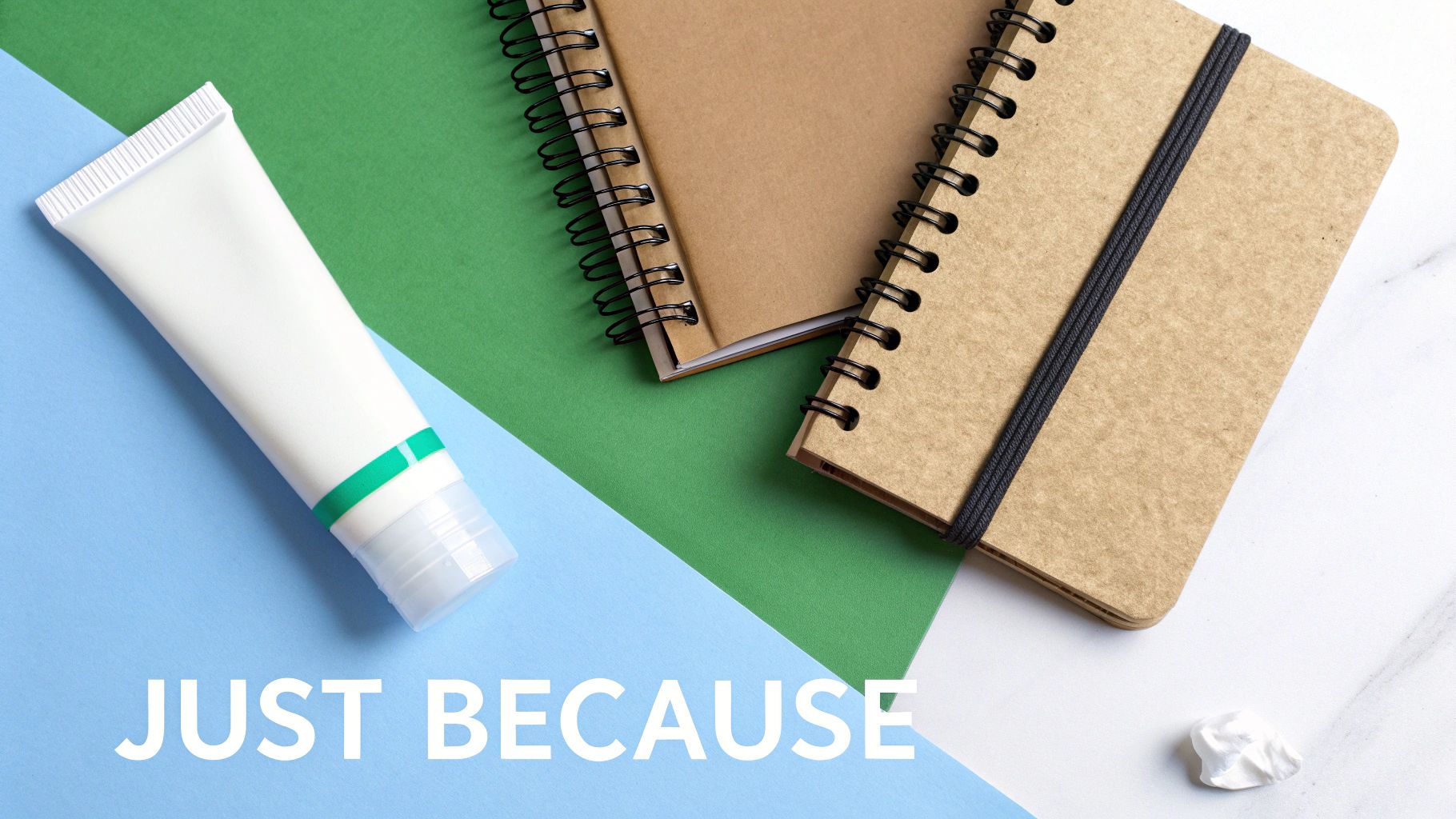 A person holding a small, beautifully wrapped gift box with a ribbon.