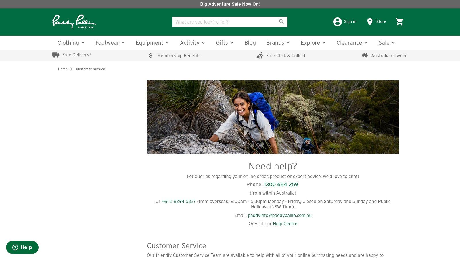 A person hiking in the mountains, which represents the type of high-quality outdoor gear available at Paddy Pallin.