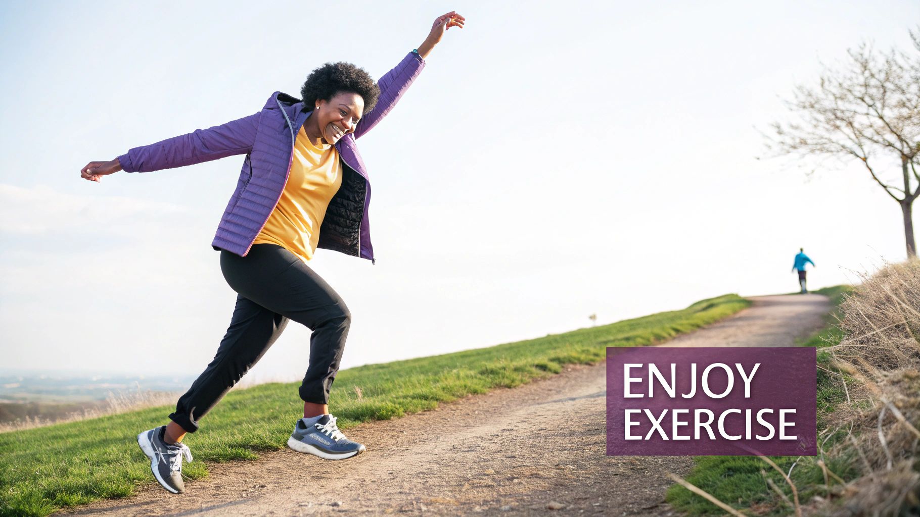 A joyful Black woman in athletic wear runs uphill on a scenic outdoor path, enjoying exercise.