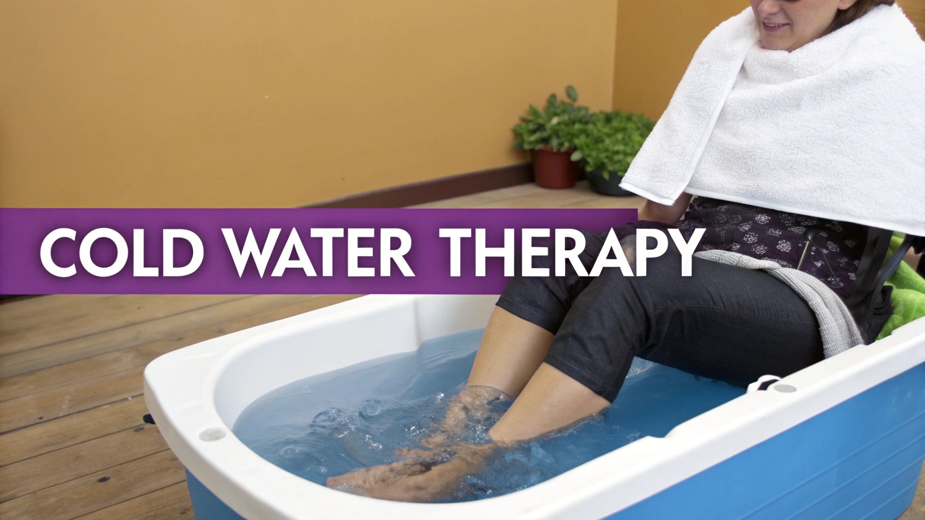 A person performs cold water therapy, soaking their legs in a blue tub, covered by a white towel.