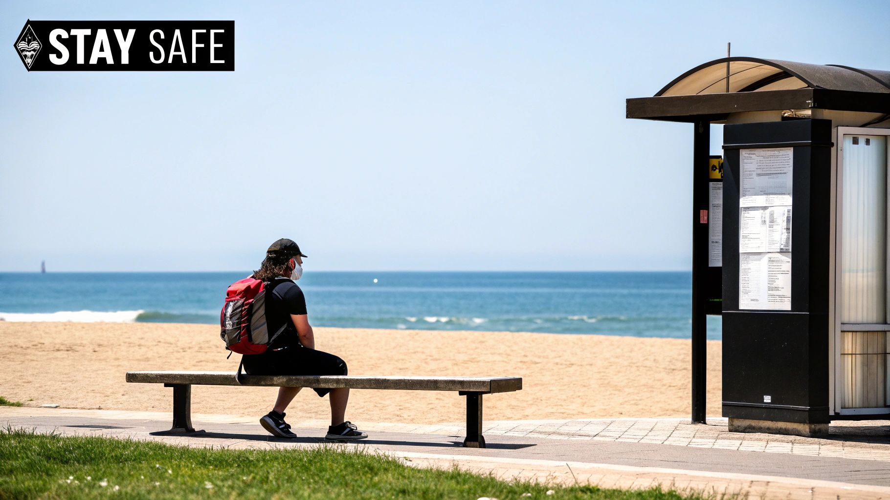 Your Guide to tour rio de janeiro: Top Sights & Tips A masked person sits on a bench overlooking a sunny beach and ocean, near a bus stop.
