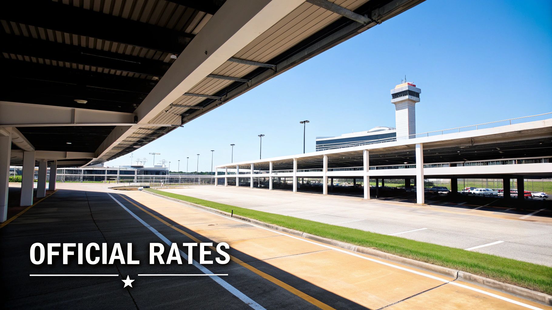 An airport parking garage and road leading to a terminal with a control tower under a clear blue sky.