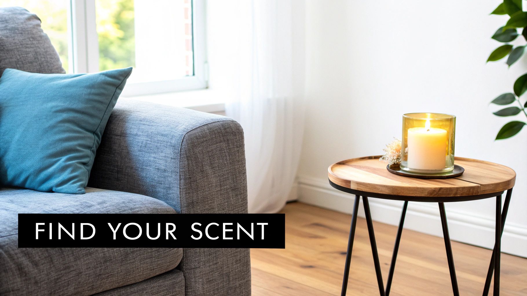 A lit scented candle on a wooden side table next to a grey sofa with a blue pillow, promoting 'Find Your Scent'.