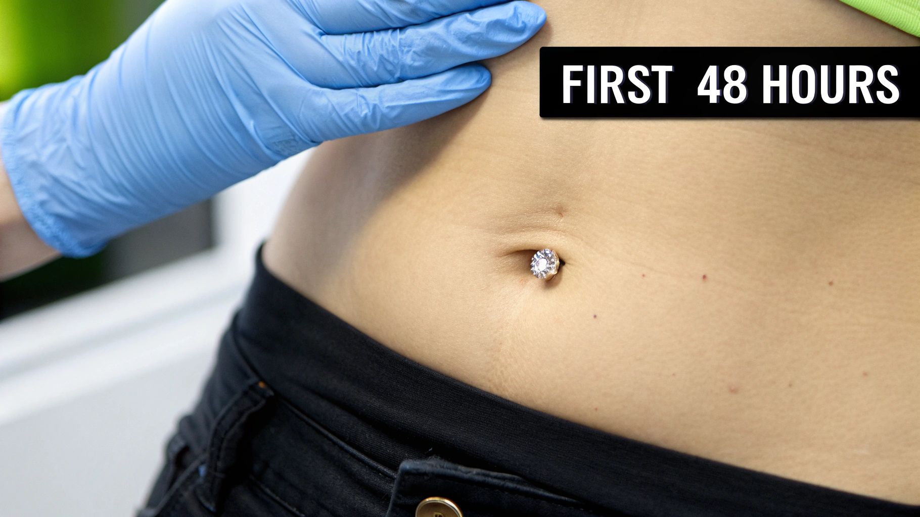 A close-up of a new navel piercing with a gloved hand, emphasizing 'First 48 Hours' of care.