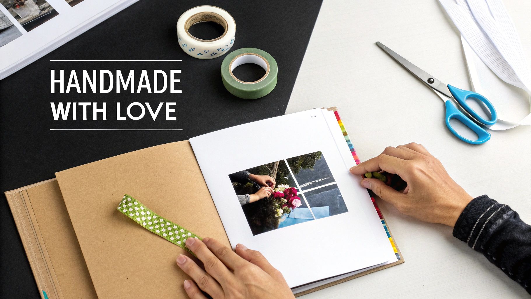 Top-down view of hands decorating a personalized photo album with ribbon, tape, and scissors.