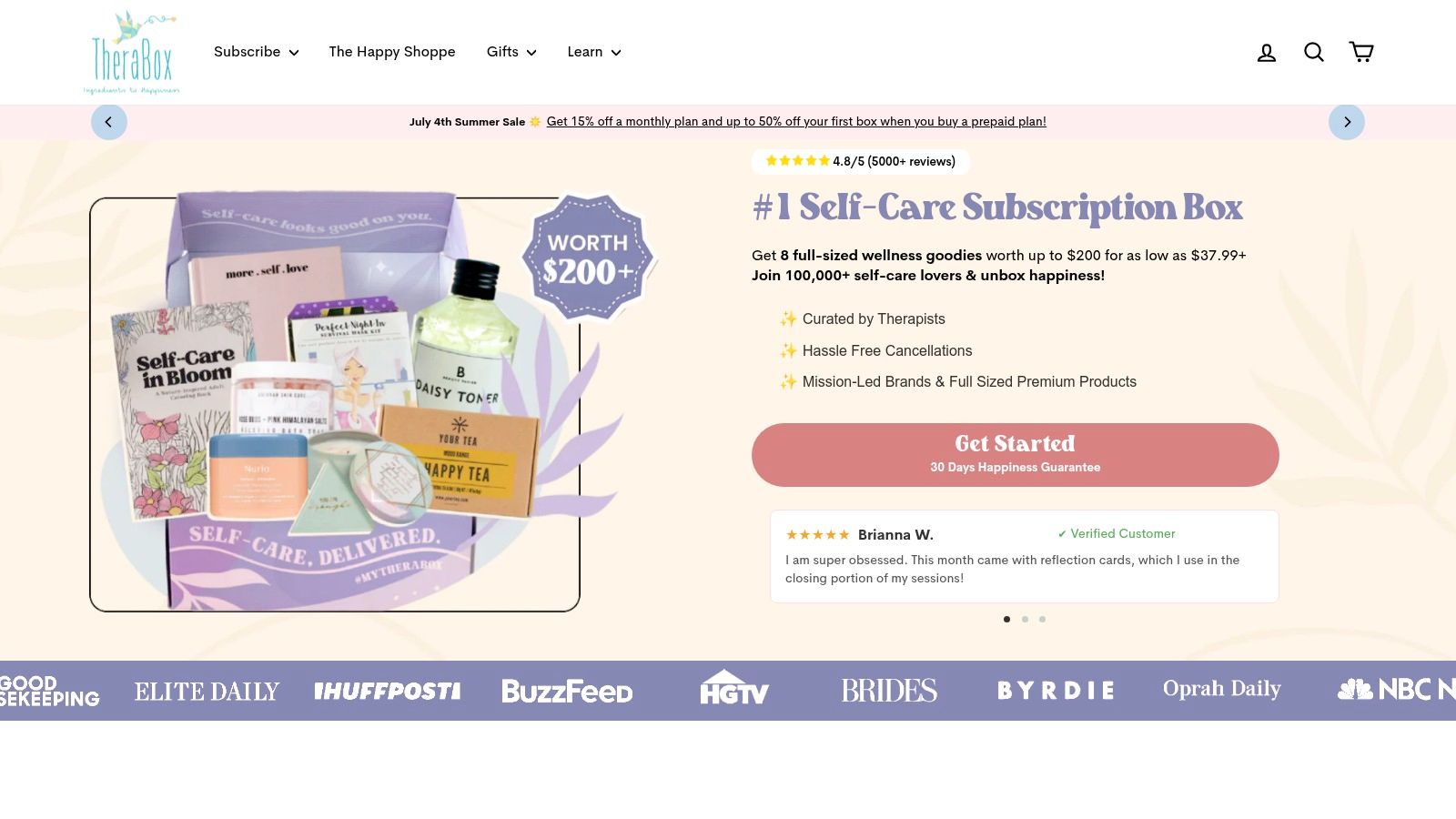A collection of TheraBox products including skincare, a journal, and other wellness items