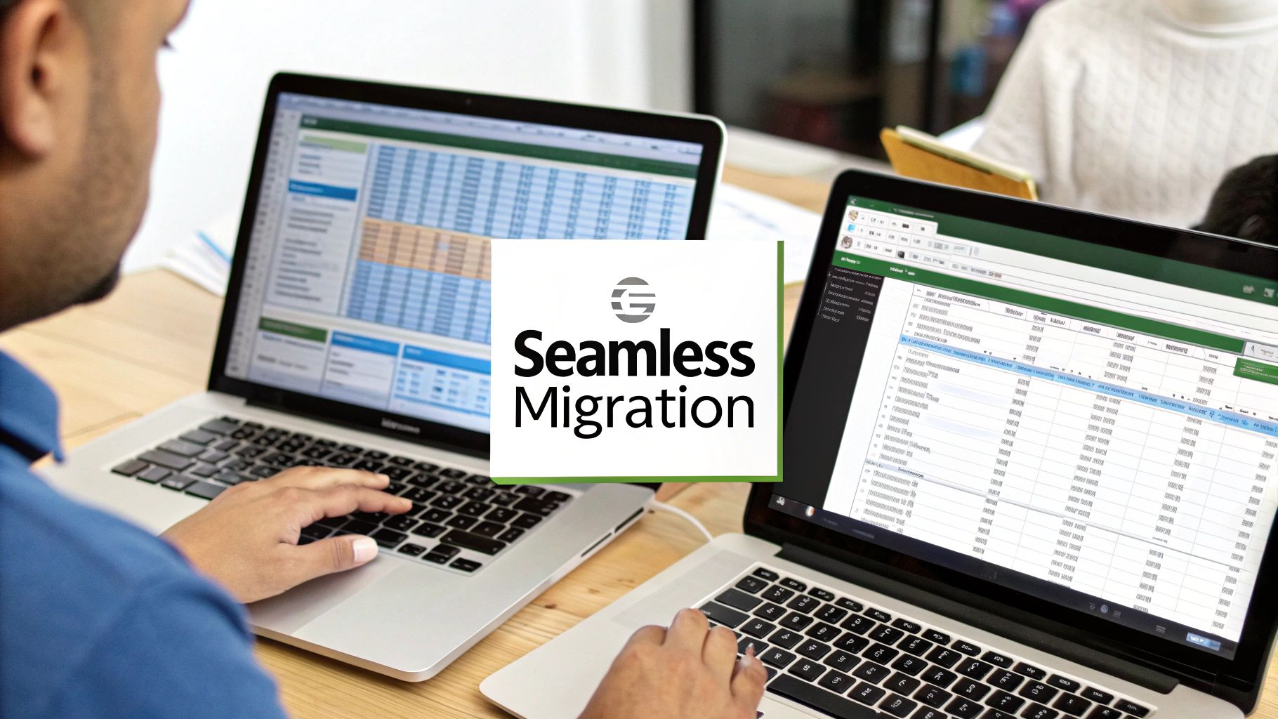 Two people working on laptops, migrating accounting data with a 'Seamless Migration' solution.