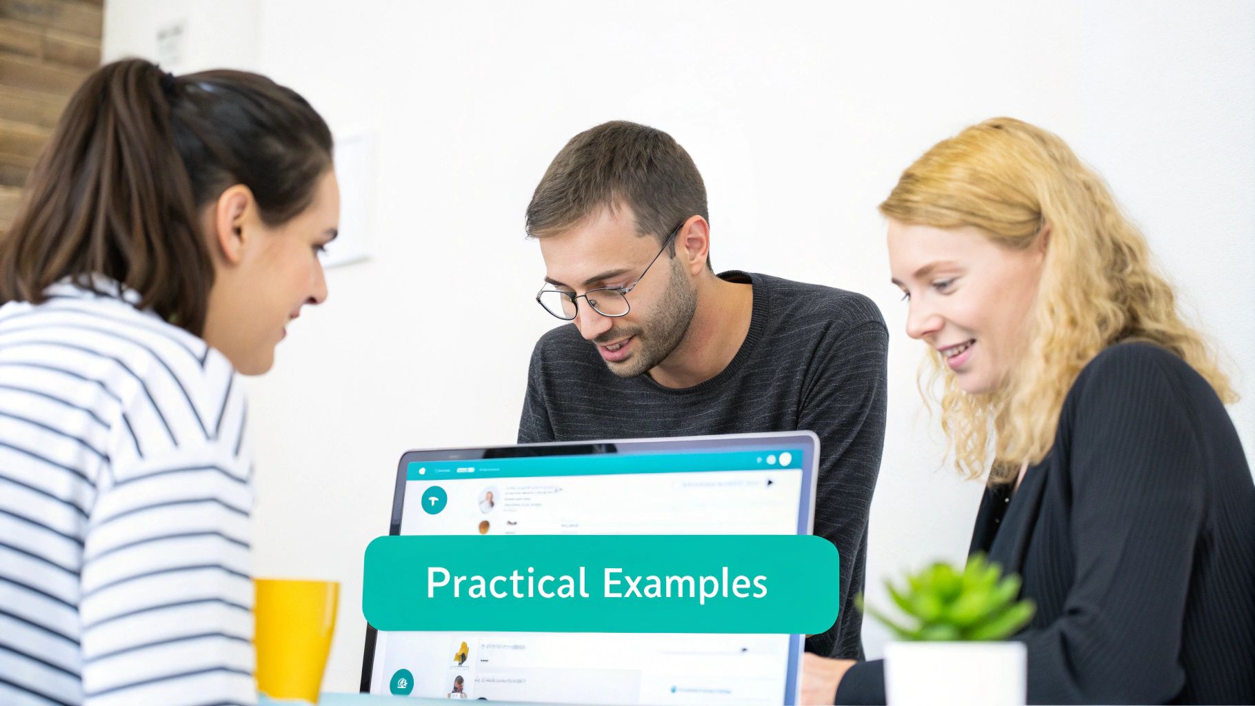 Three smiling colleagues intently looking at a laptop screen displaying "Practical Examples" text.