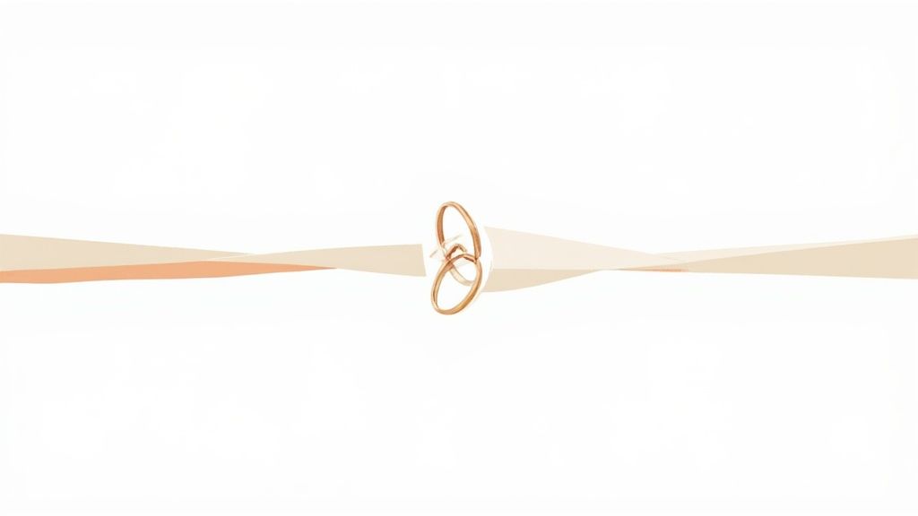 Two golden wedding rings intertwined on a subtle, twisting beige ribbon against a white background.