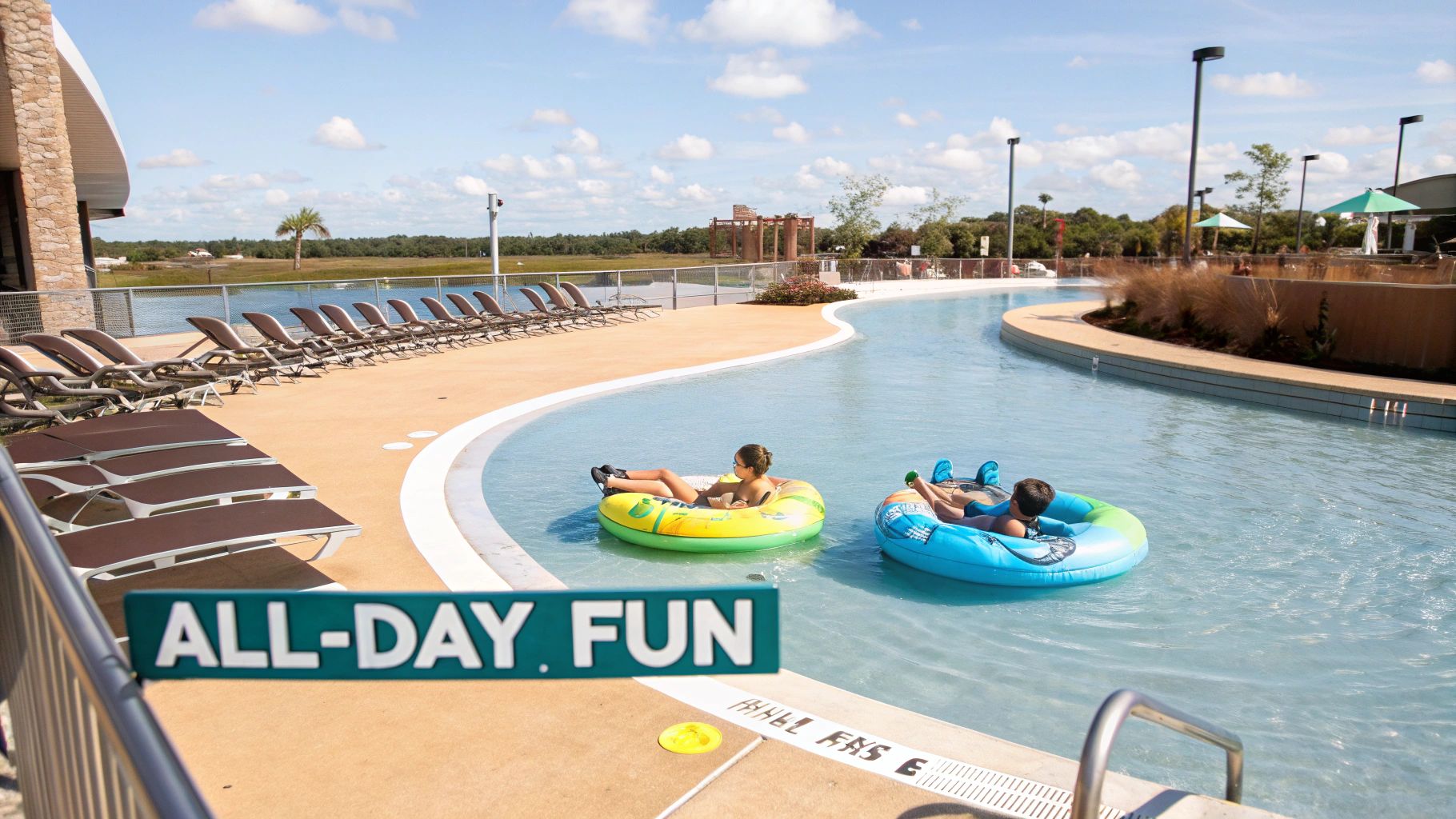 Kids enjoy a sunny day floating in tubes along a lazy river at a vibrant family resort, promising all-day fun.
