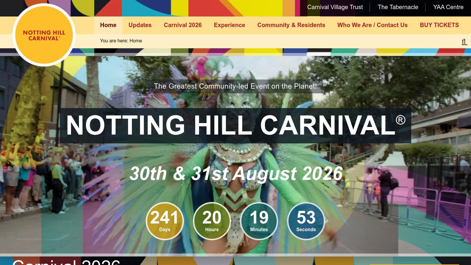 A performer in colourful costume at the Notting Hill Carnival parade