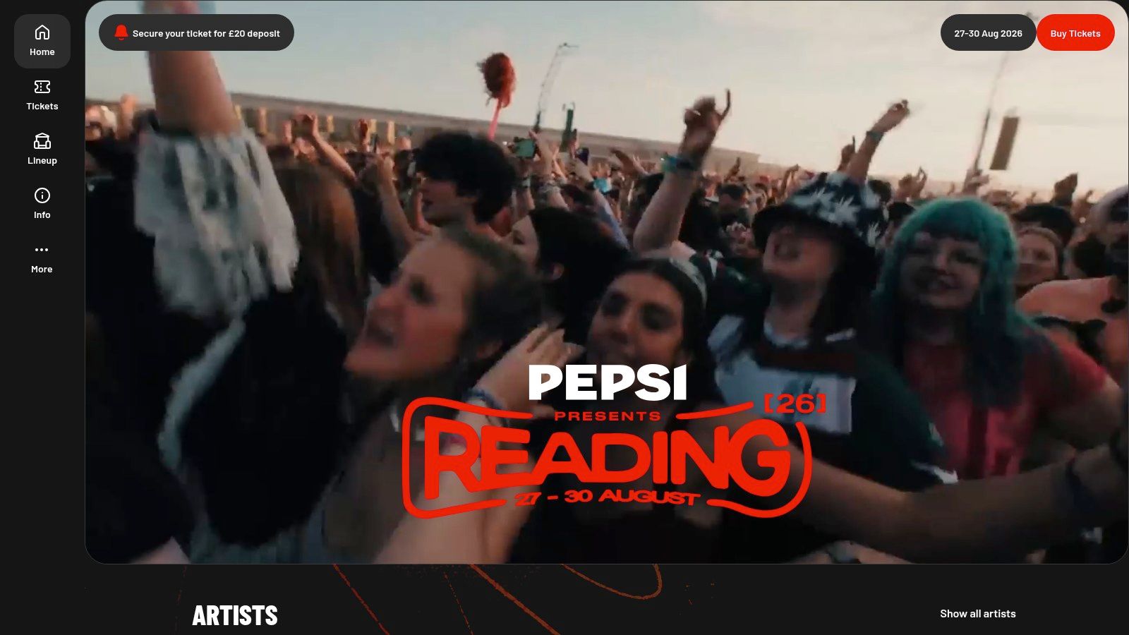 A large crowd at a music festival stage with vibrant lights and effects