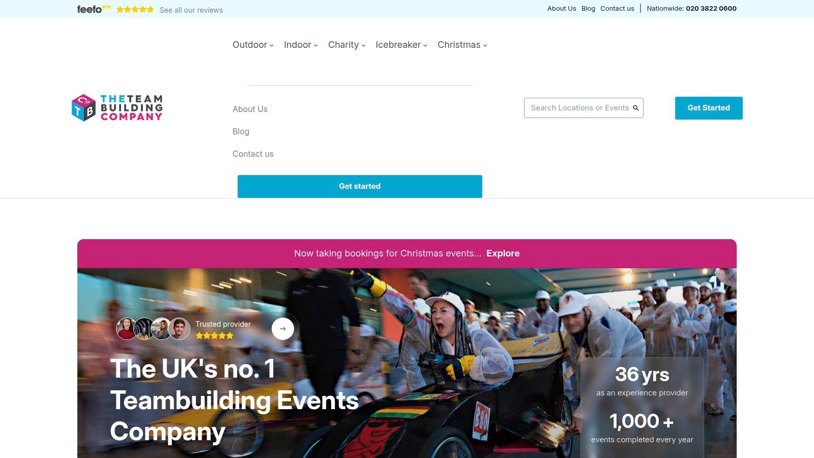 The Team Building Company staff facilitating an outdoor challenge