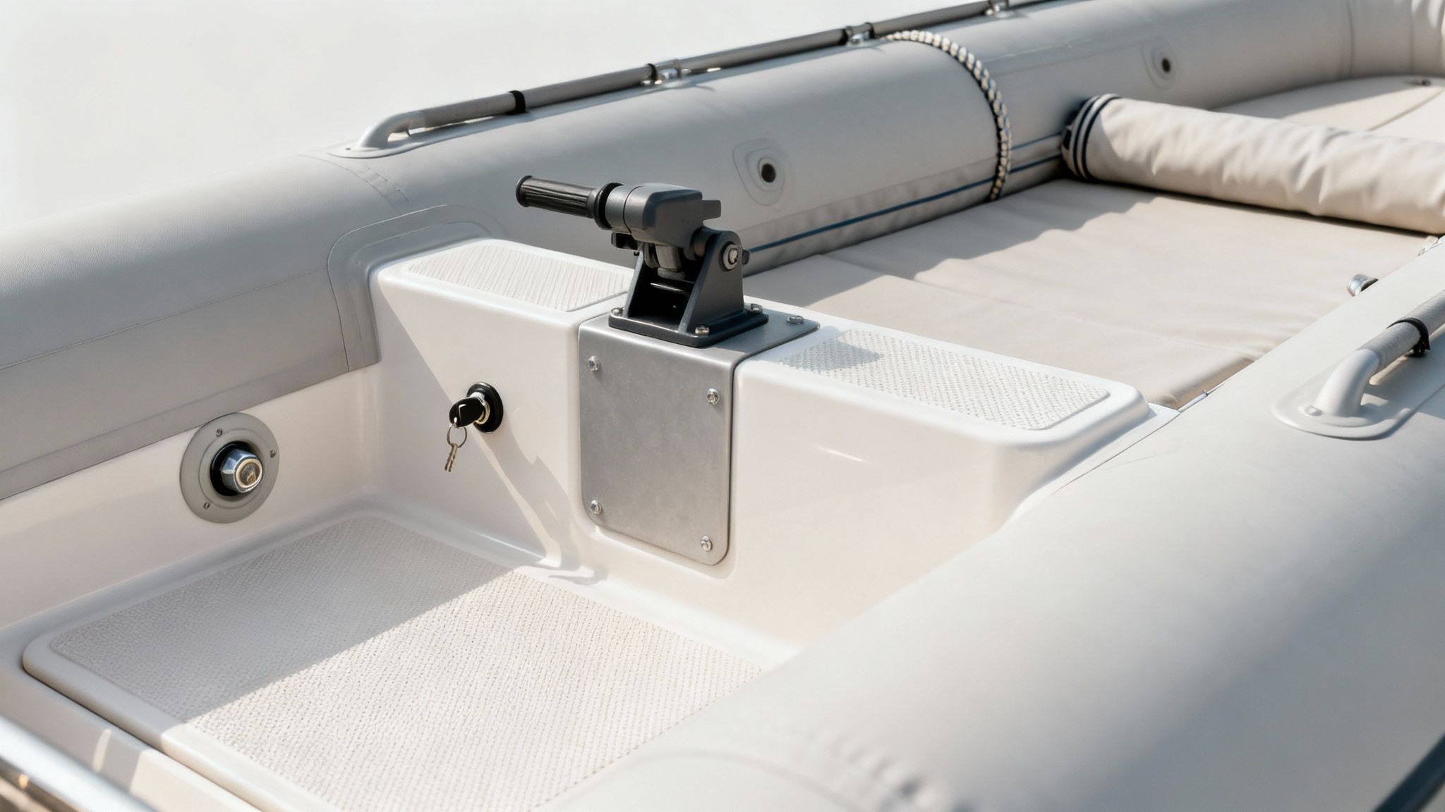 People inspecting a white tender boat on the grass