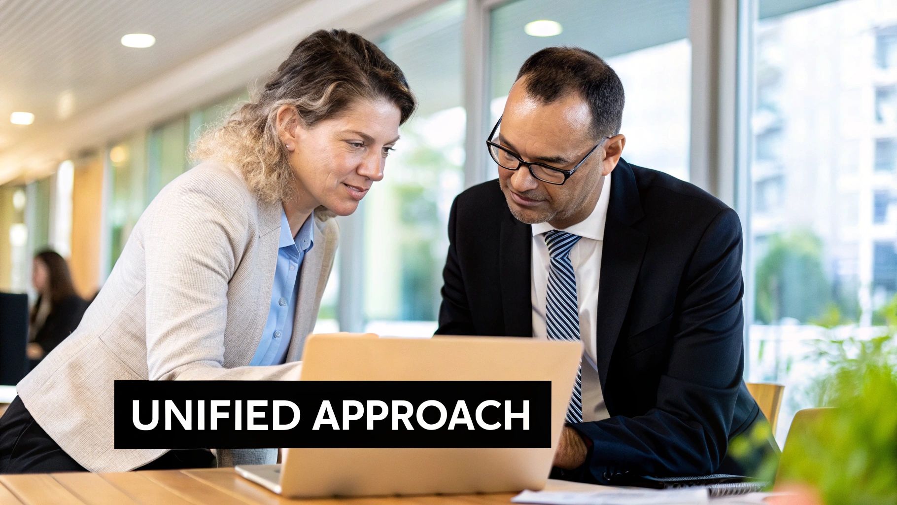A group of people collaborating around a whiteboard with sticky notes, symbolizing answering questions about product management.