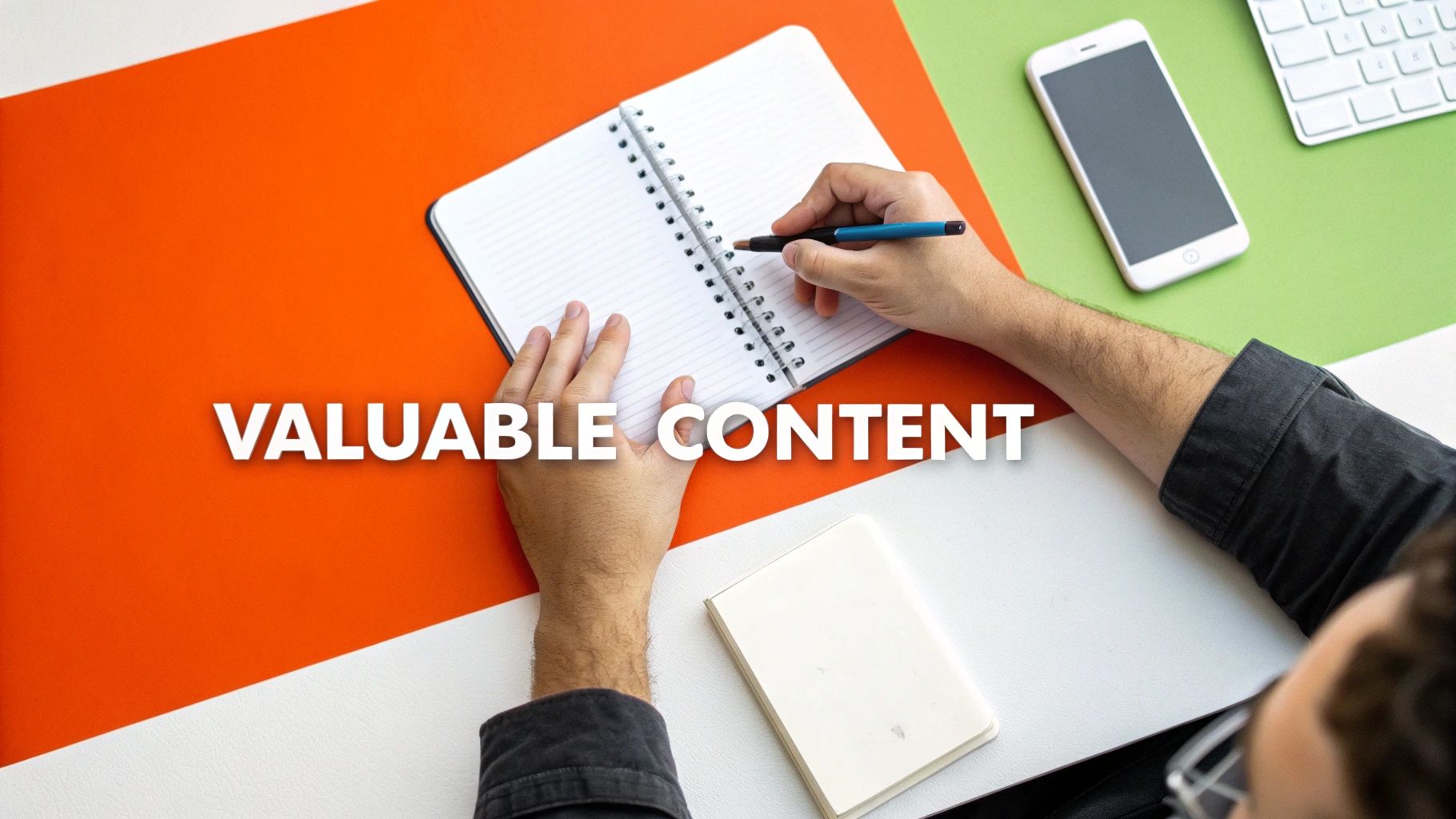 A person typing on a laptop with Reddit's logo in the background, symbolizing content creation for the platform.