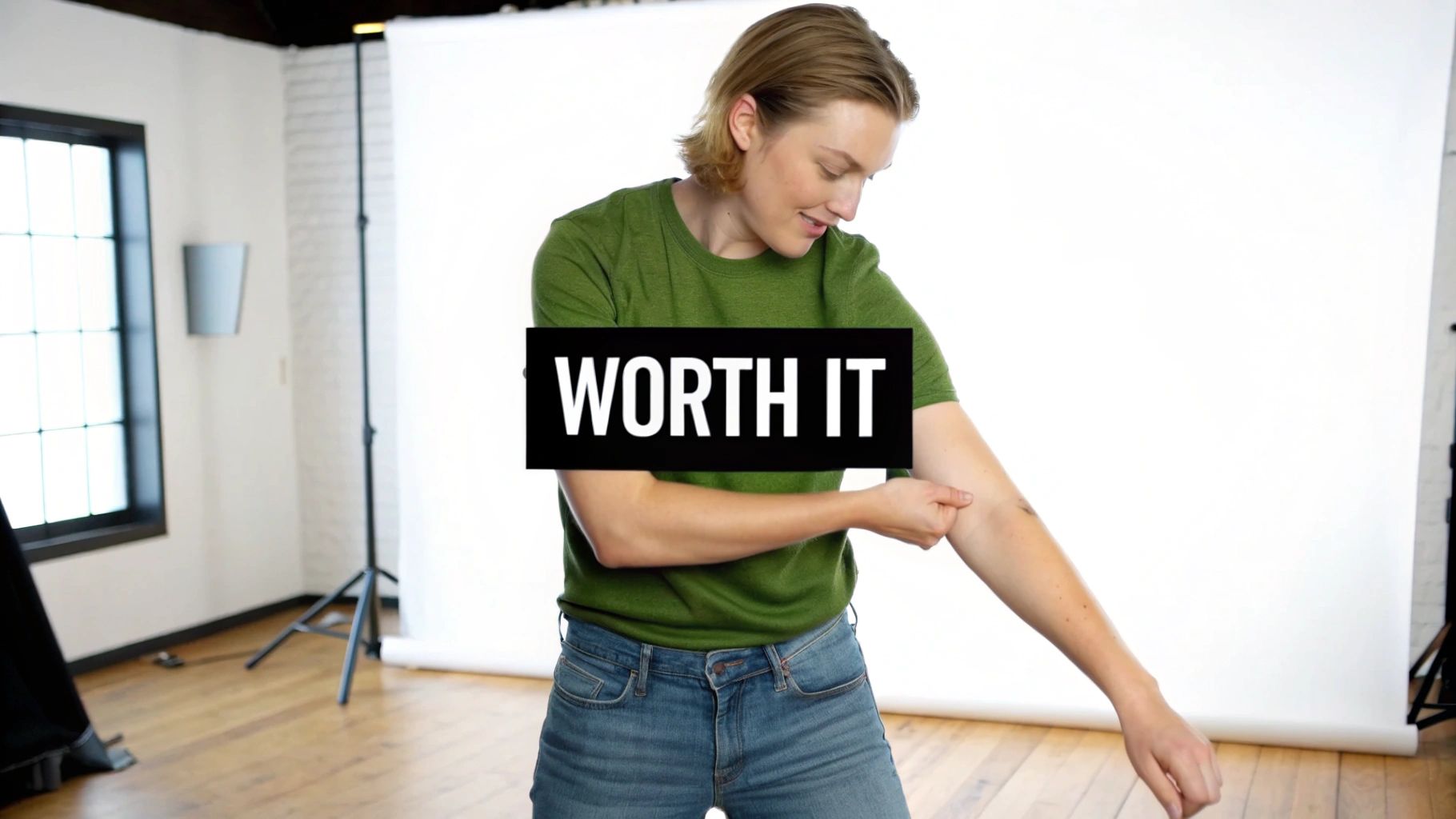 A person in a green t-shirt examining their arm with a 'WORTH IT' text overlay.