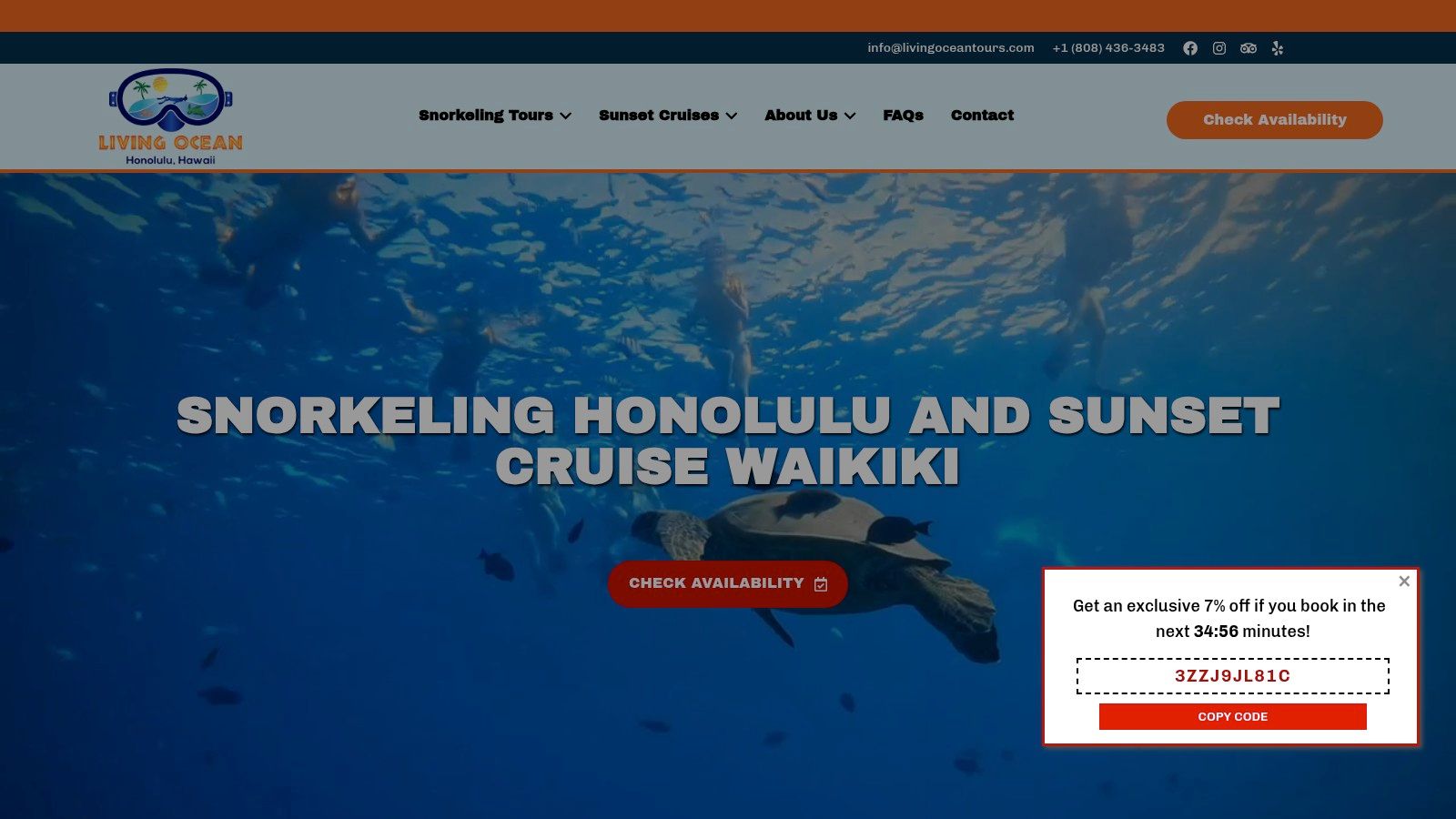 A Living Ocean Tours boat with guests snorkeling in the clear blue waters of Honolulu.