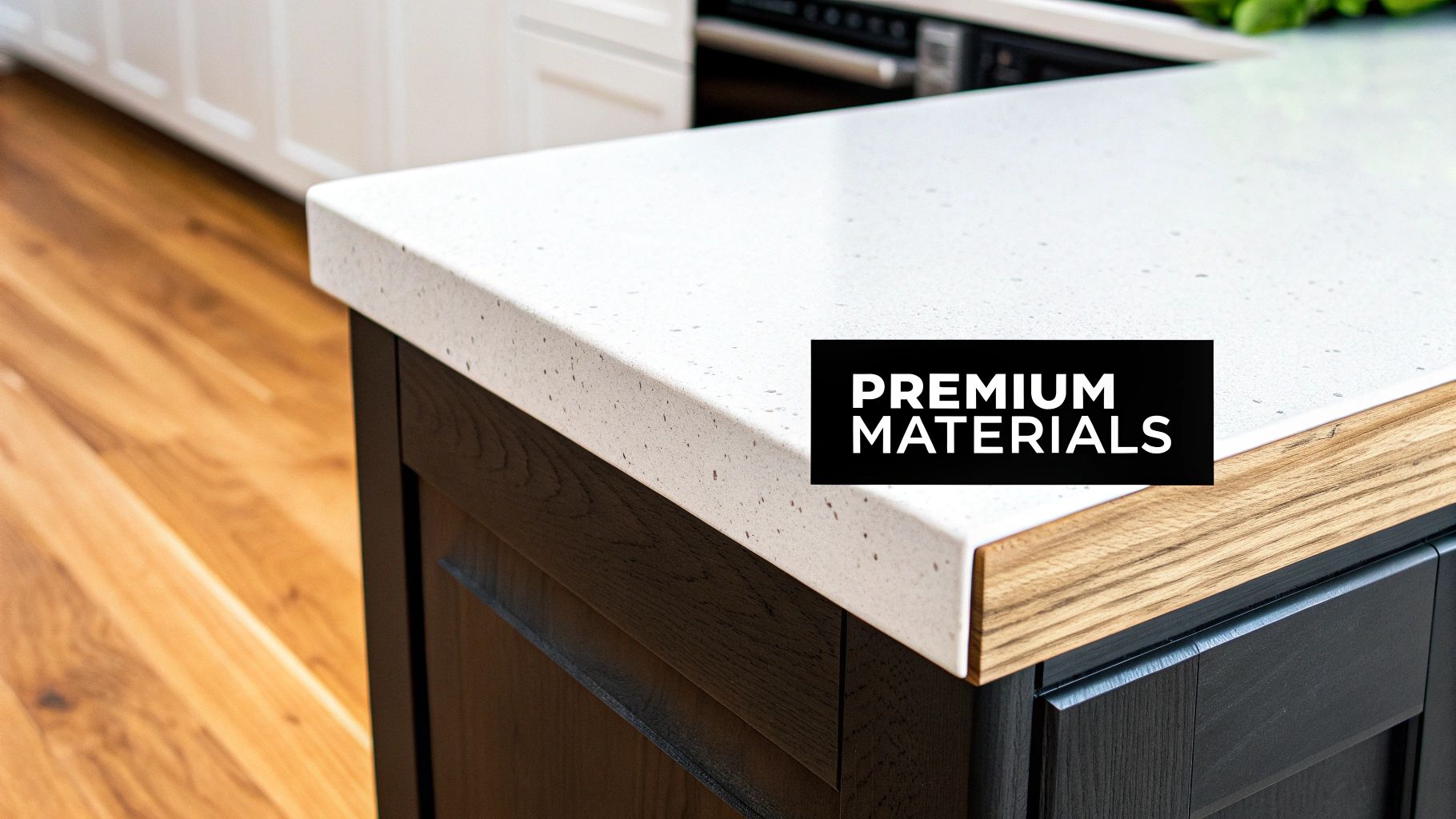 A modern kitchen island featuring a white speckled quartz countertop, dark wood cabinets, and natural wood trim.