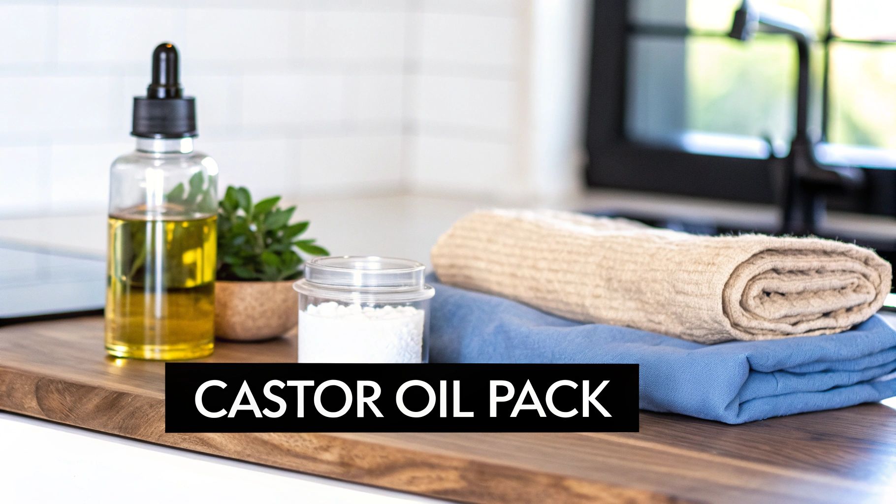 A castor oil bottle, white powder, and two folded cloths arranged on a wooden countertop.
