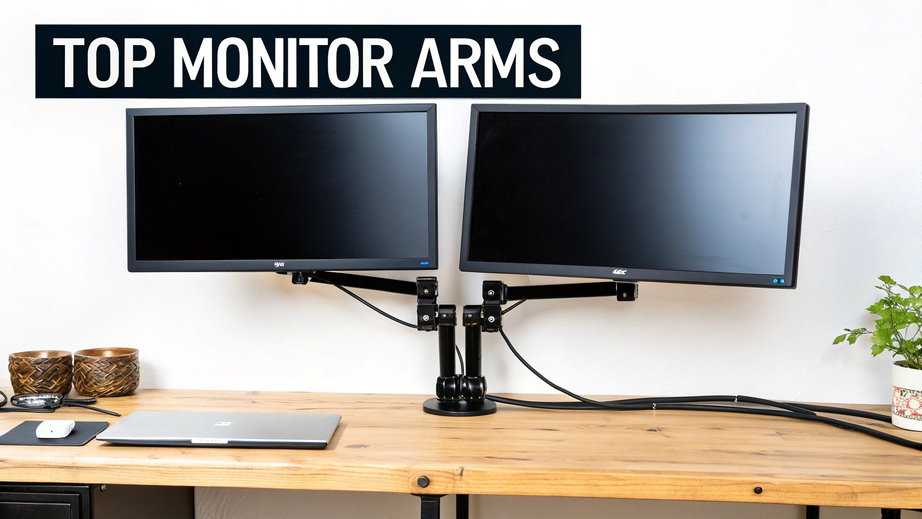 Dual monitor arms on a clean desk