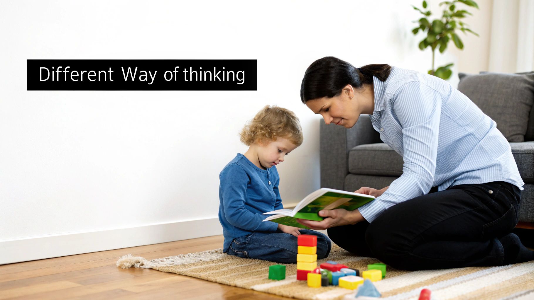 A child looking thoughtfully at a book in a comfortable, supportive setting.