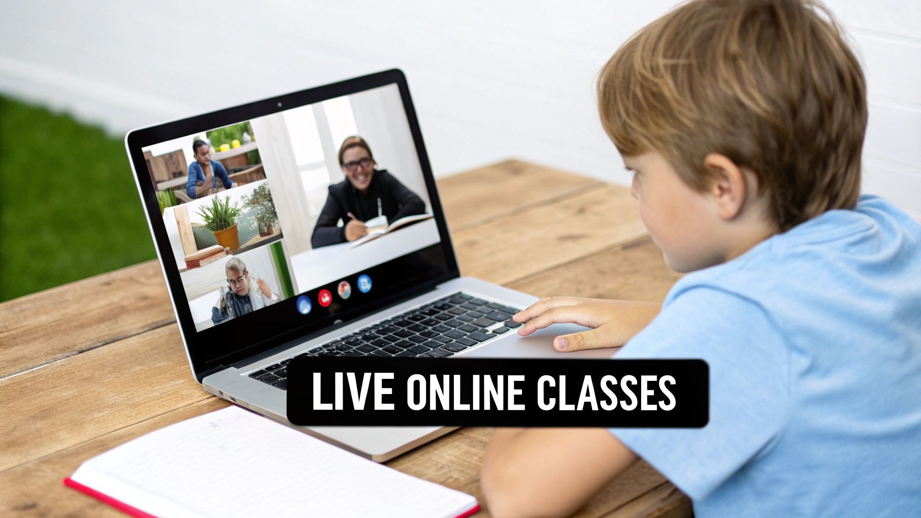 Young boy engaged in live online classes on a laptop, with a teacher on screen.