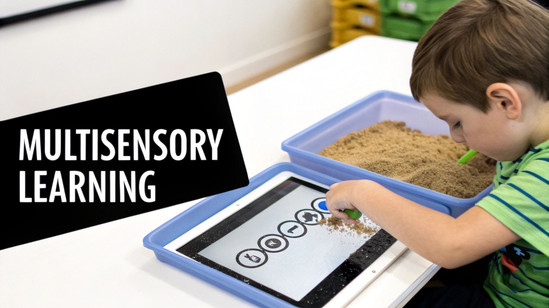 A child uses a multisensory learning setup with a tablet and sand, guided by a 'MULTISENSORY LEARNING' sign.