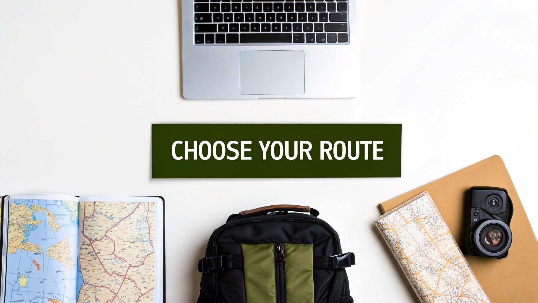 Flat lay of travel planning essentials: laptop, maps, backpack, and camera, with 'CHOOSE YOUR ROUTE' text.