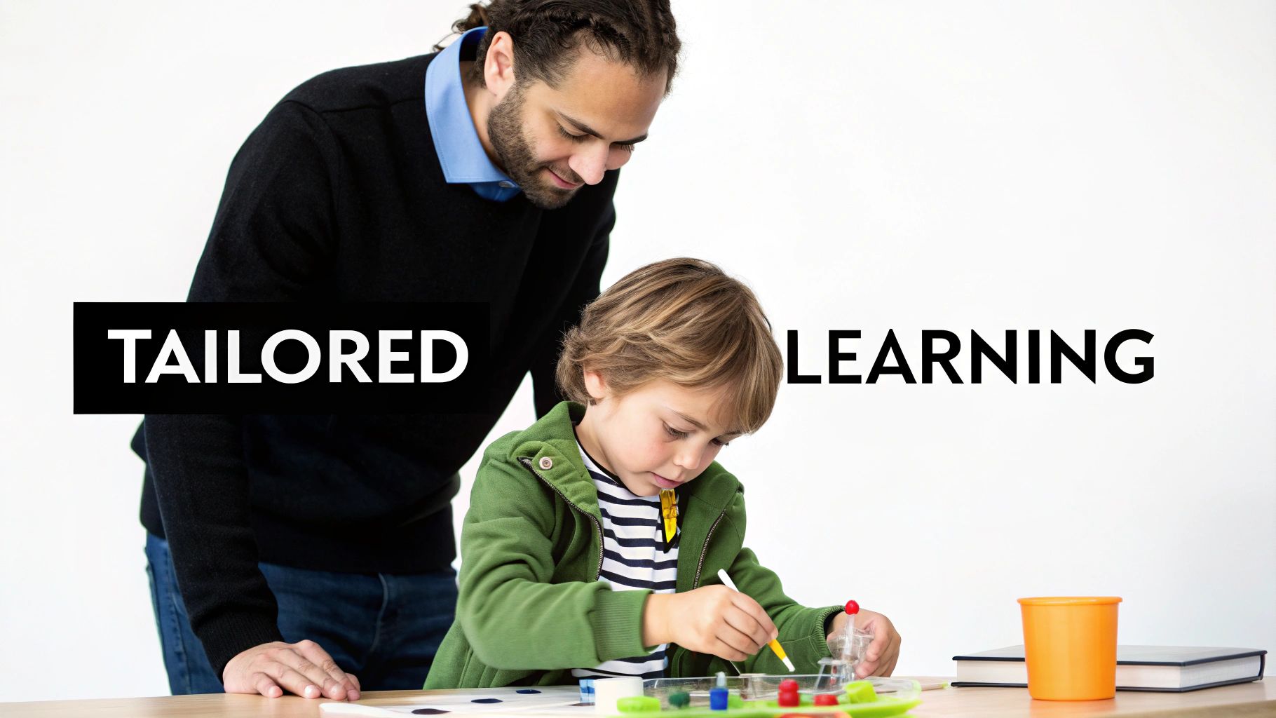 An adult supervises a young child intently engaged in a hands-on tailored learning activity at a desk.